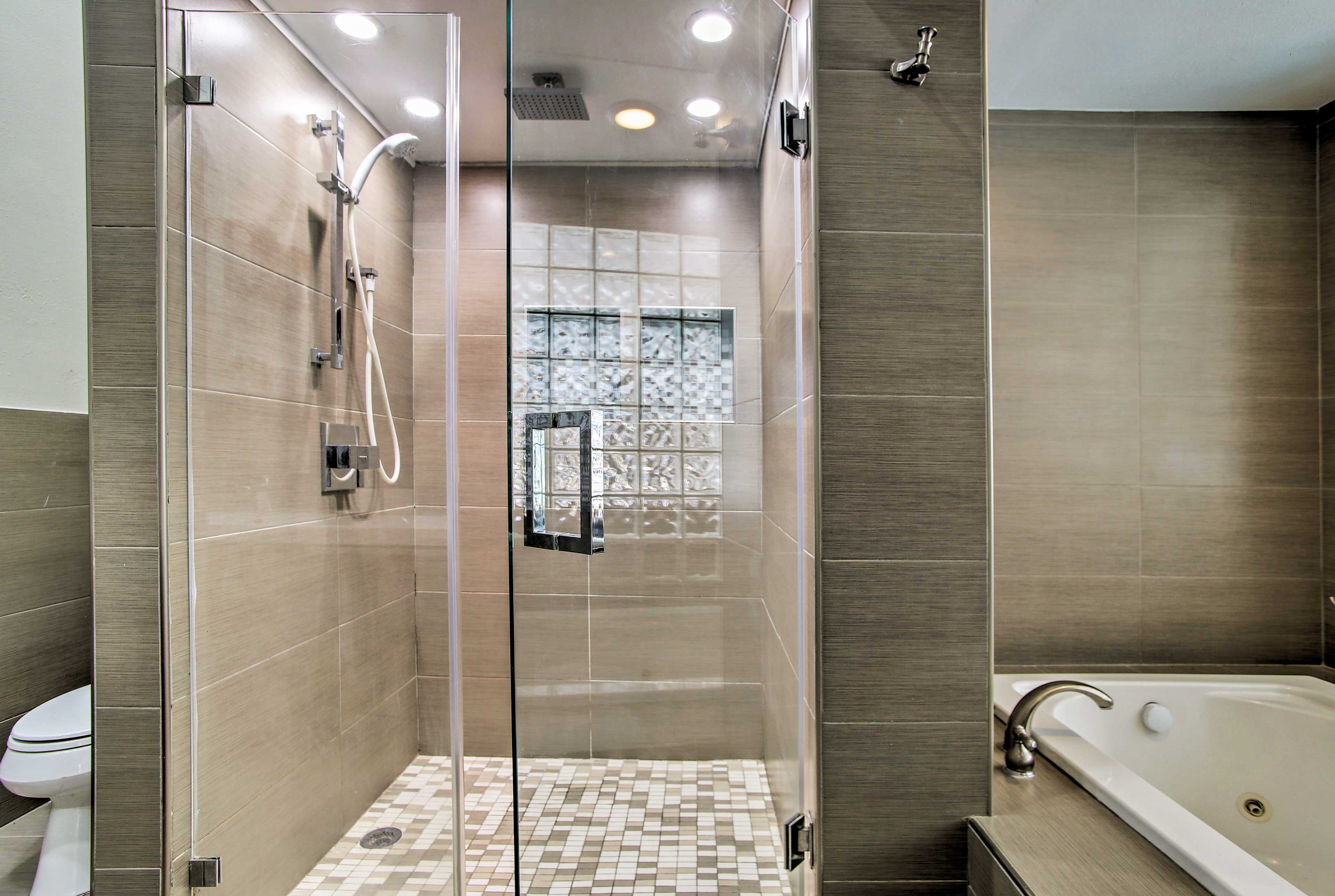 Choose to rinse off in the walk-in shower, or soak in the tub.
