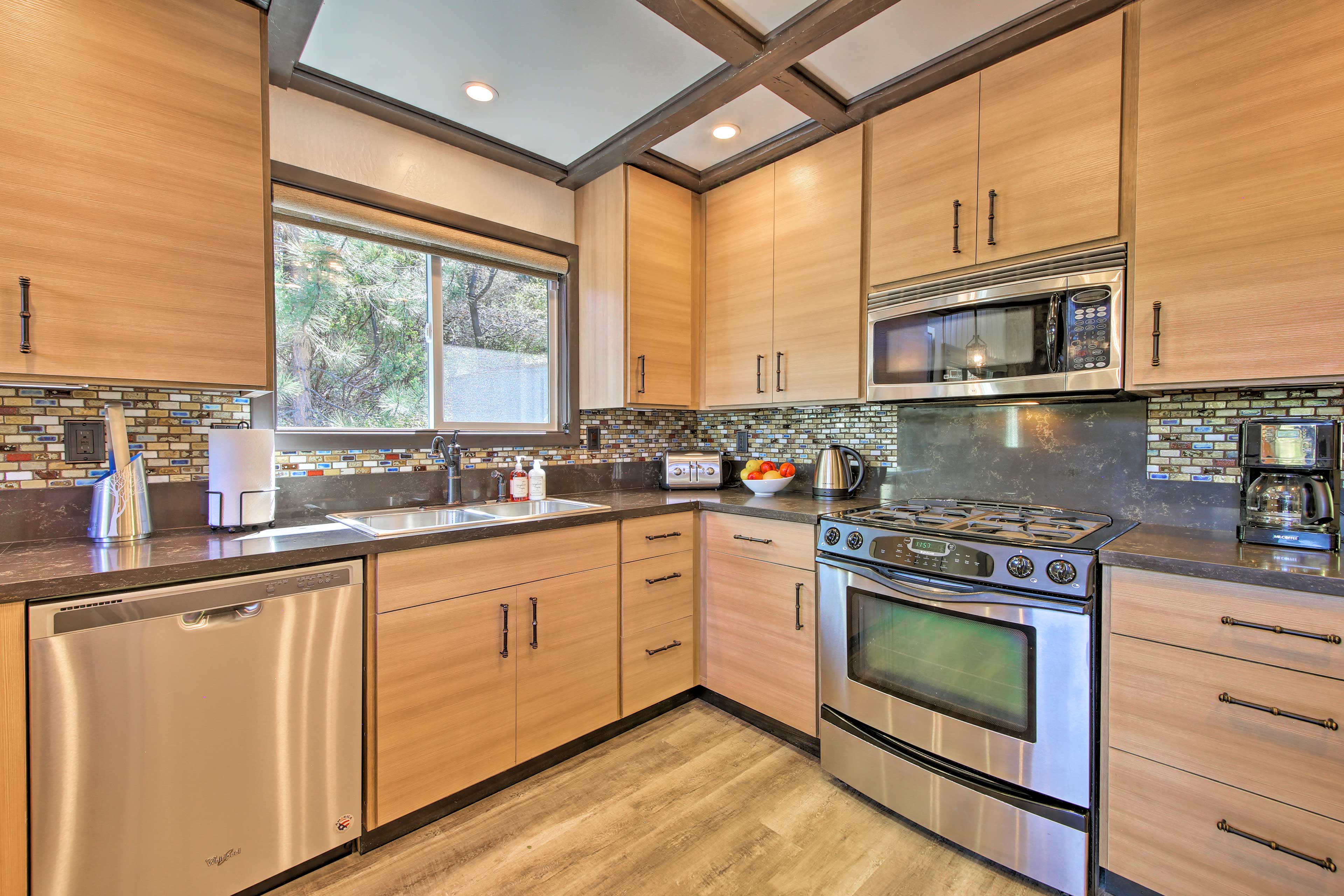 Stainless steel appliances highlight the kitchen.