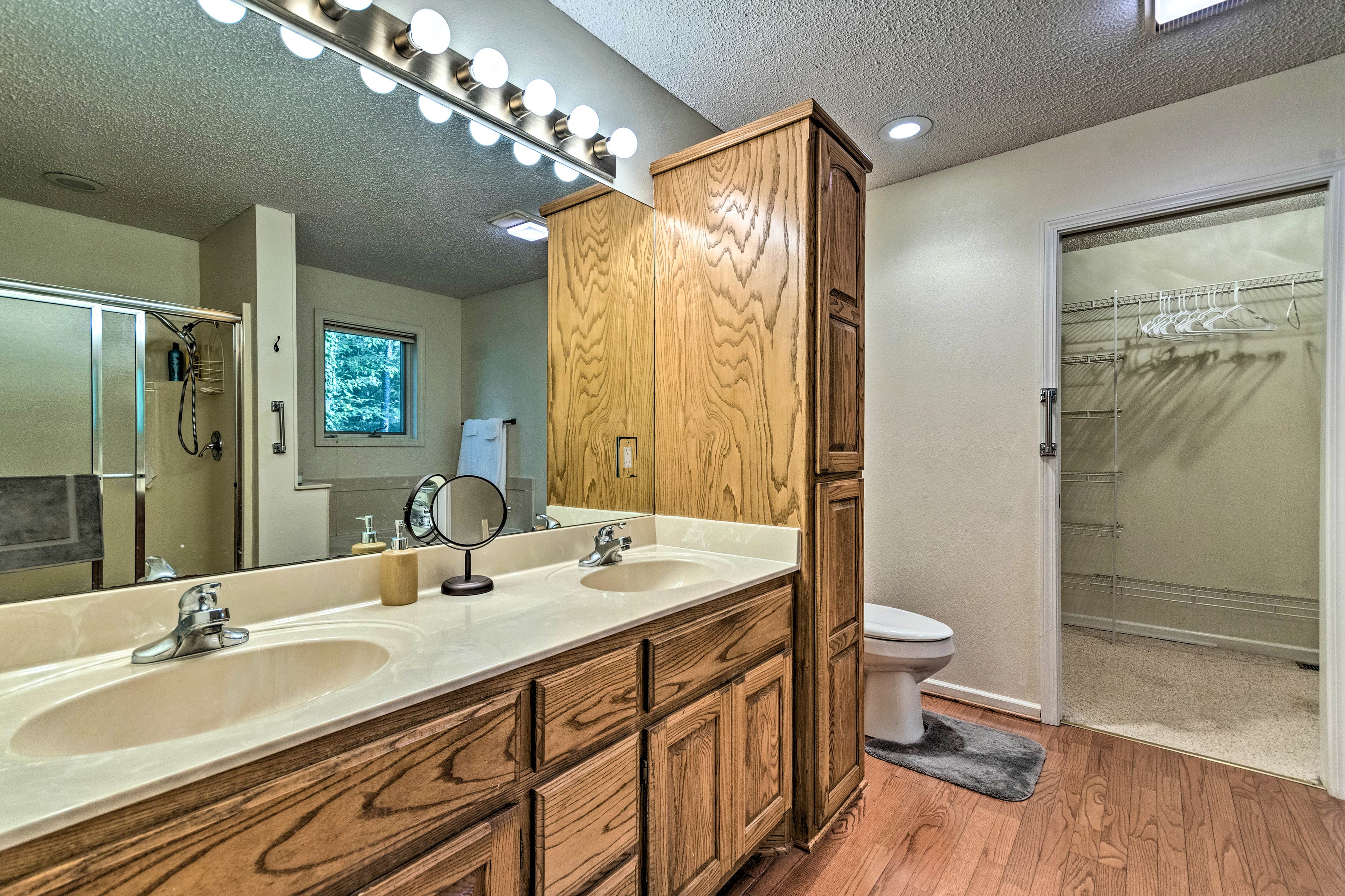 Brush your teeth side-by-side at the dual-sink vanity.