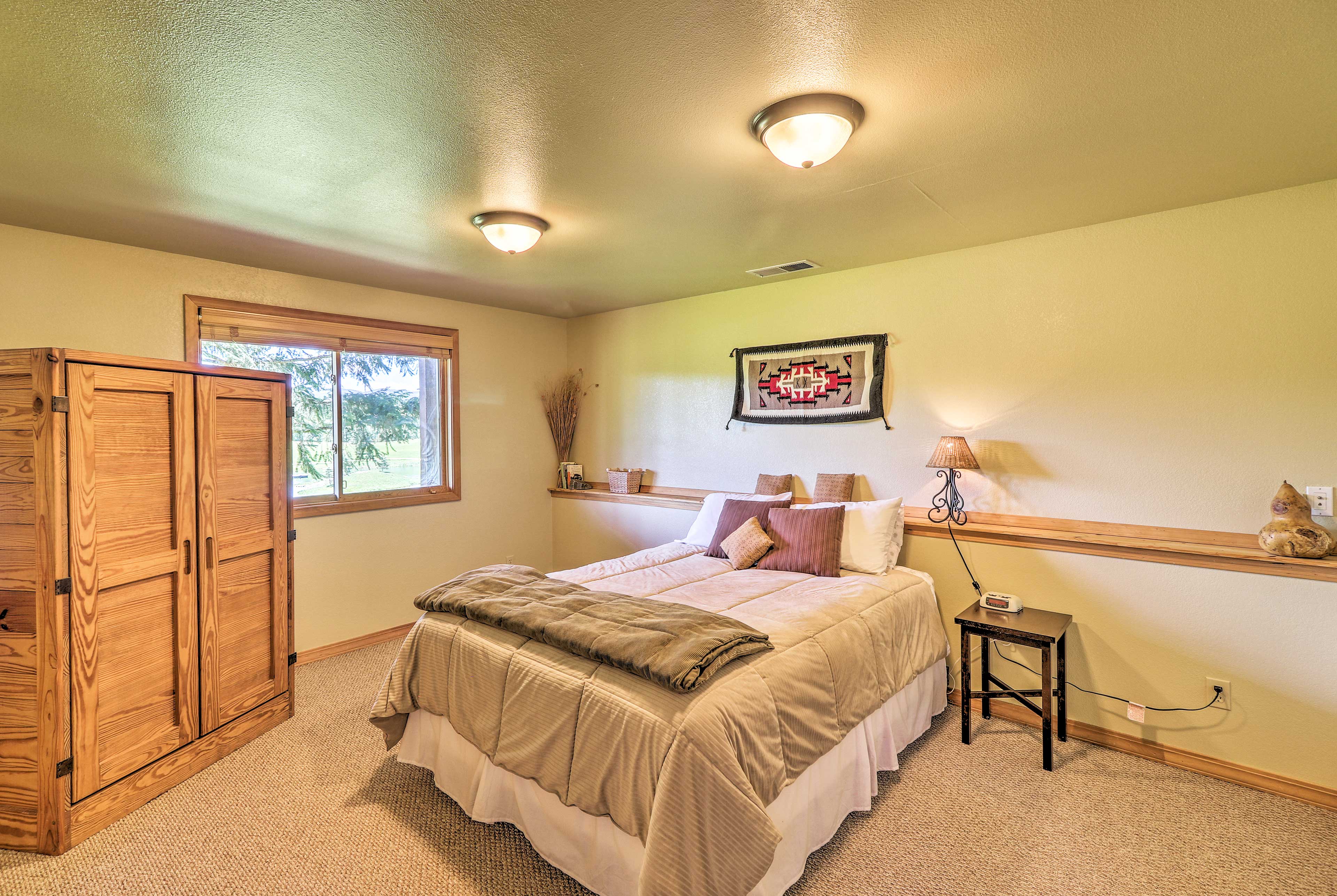 The second bedroom has an additional queen-sized bed.