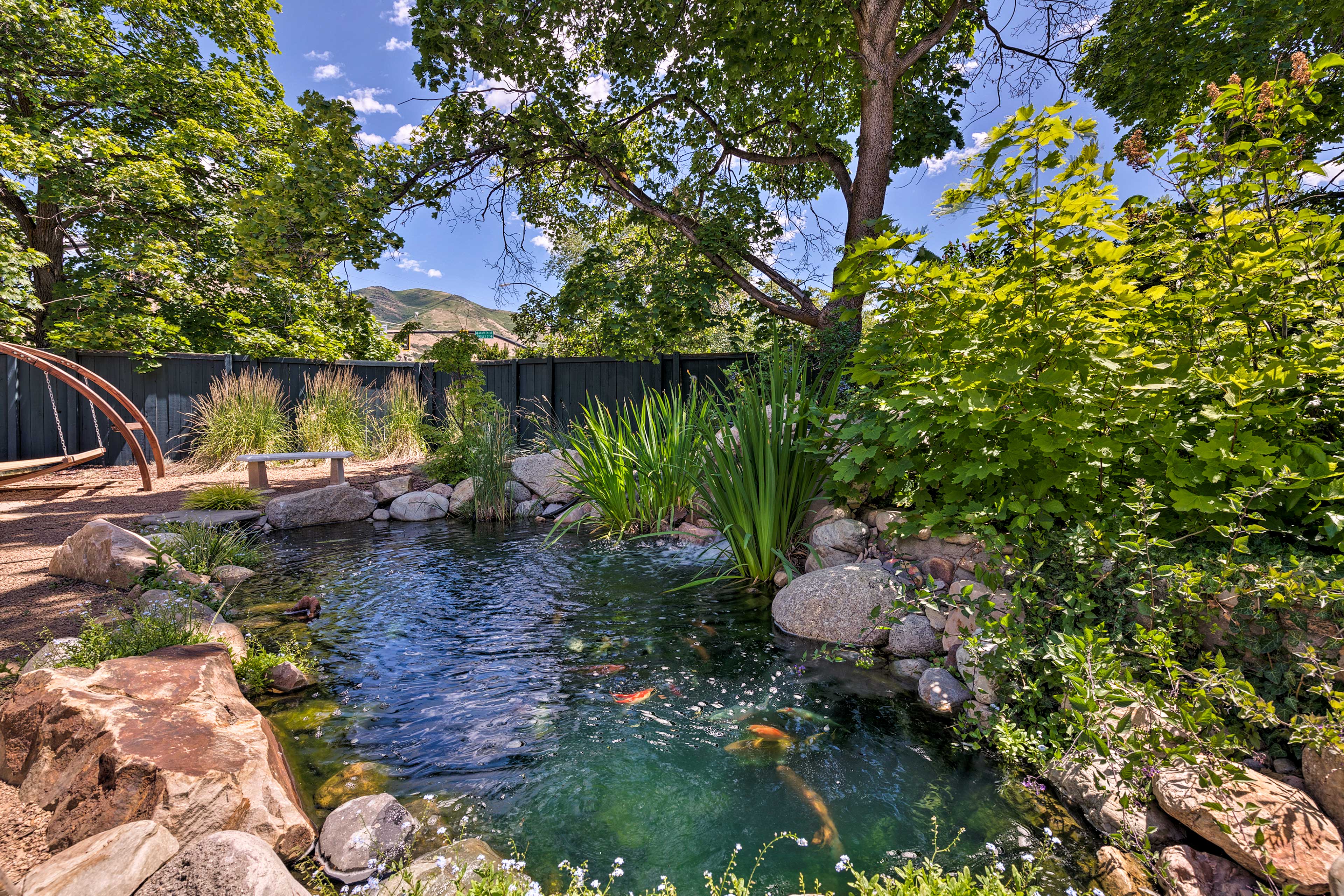 Enjoy unique amenities like a koi pond, hammock, sun-drenched deck, and more!