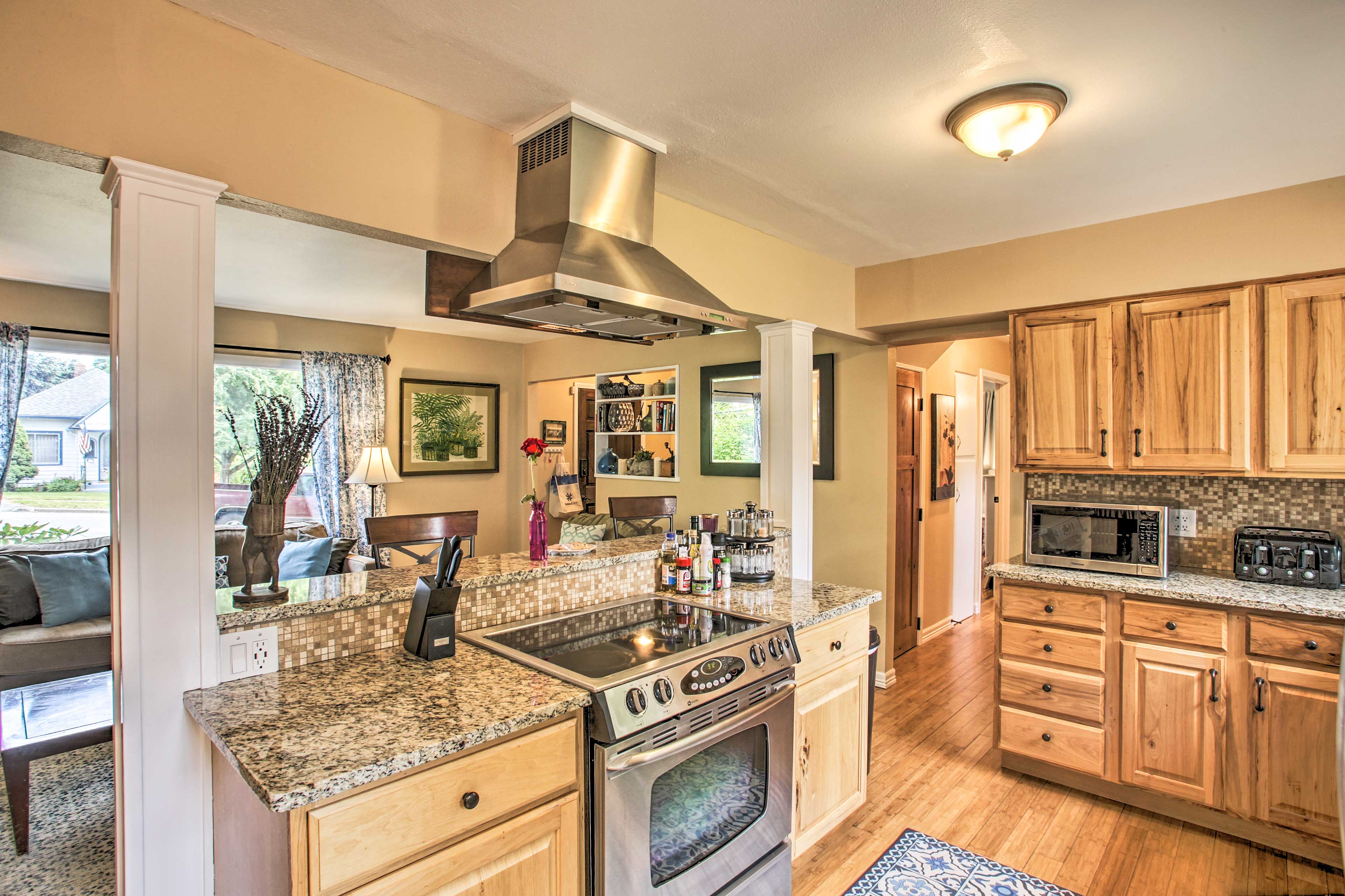 The kitchen is fully equipped with appliances, spices, and all the basics.