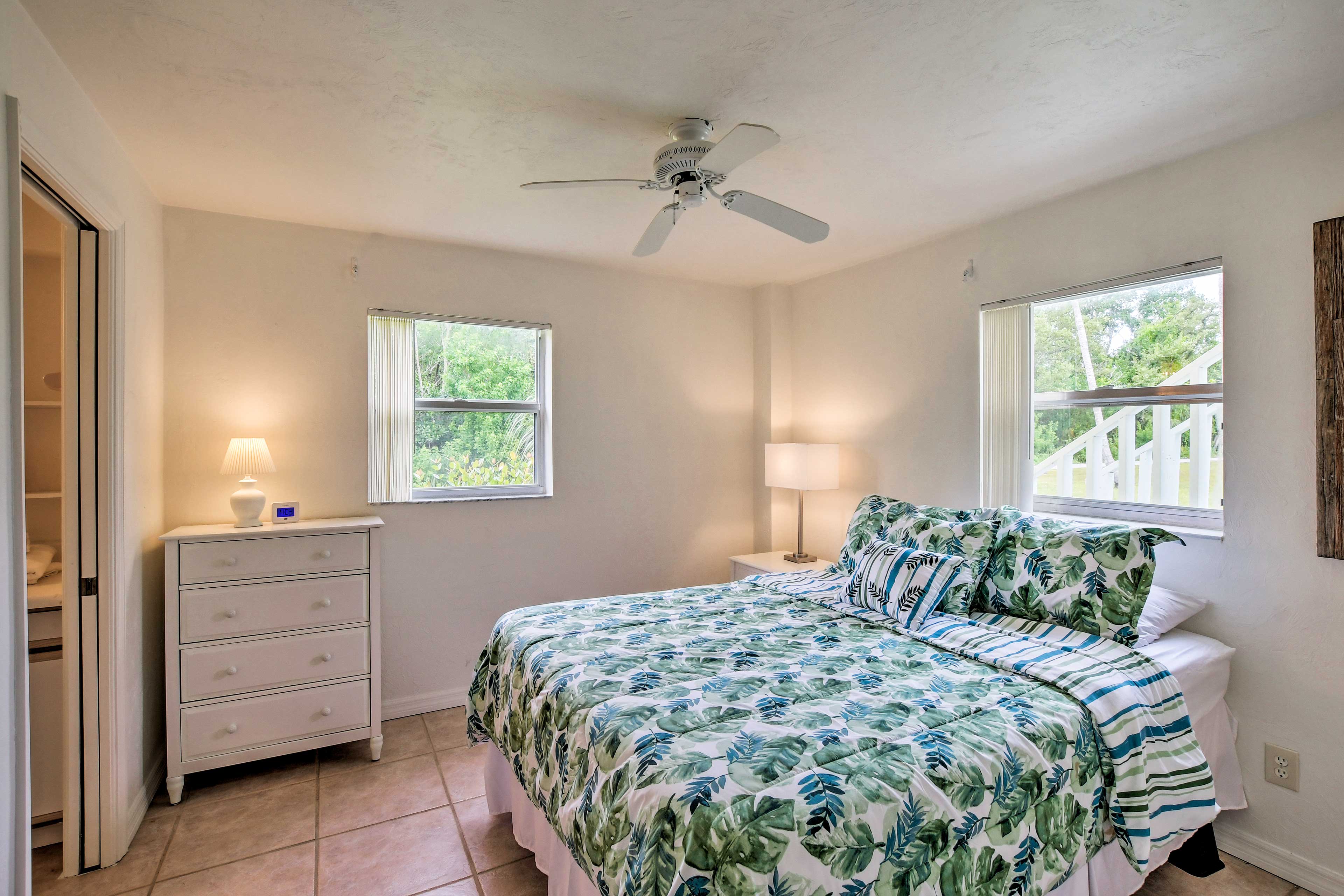 Sleep easy in this lovely queen bedroom.