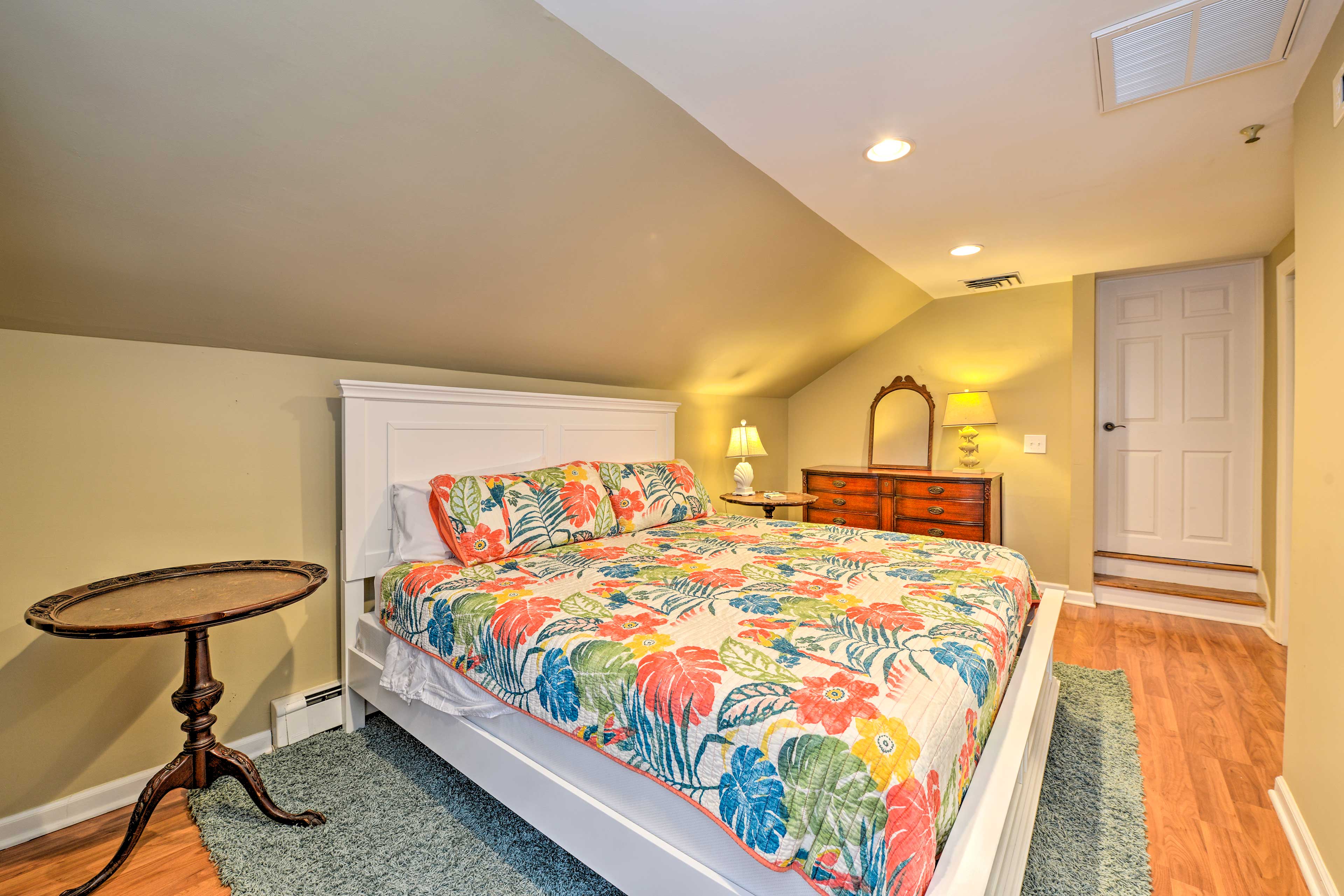 You'll find a luxury California king bed in the master bedroom.