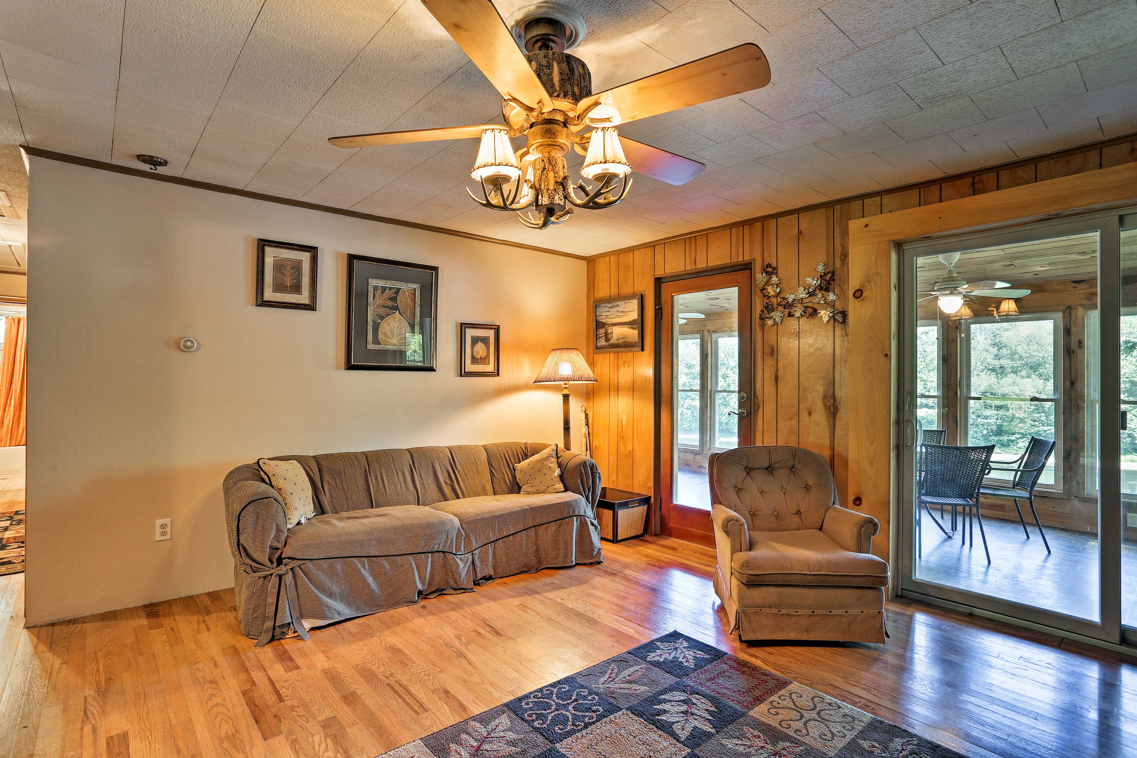 The living room opens to a sunroom.