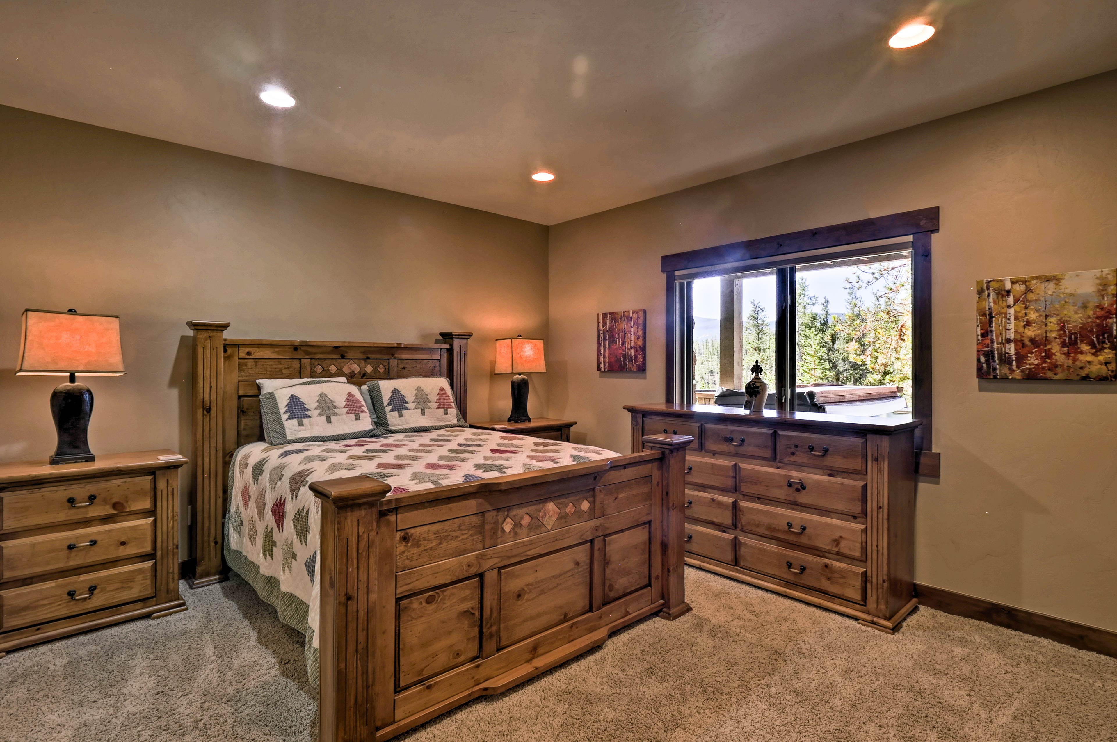 Bedroom 3 has a queen bed & the same mountain views as the hot tub.