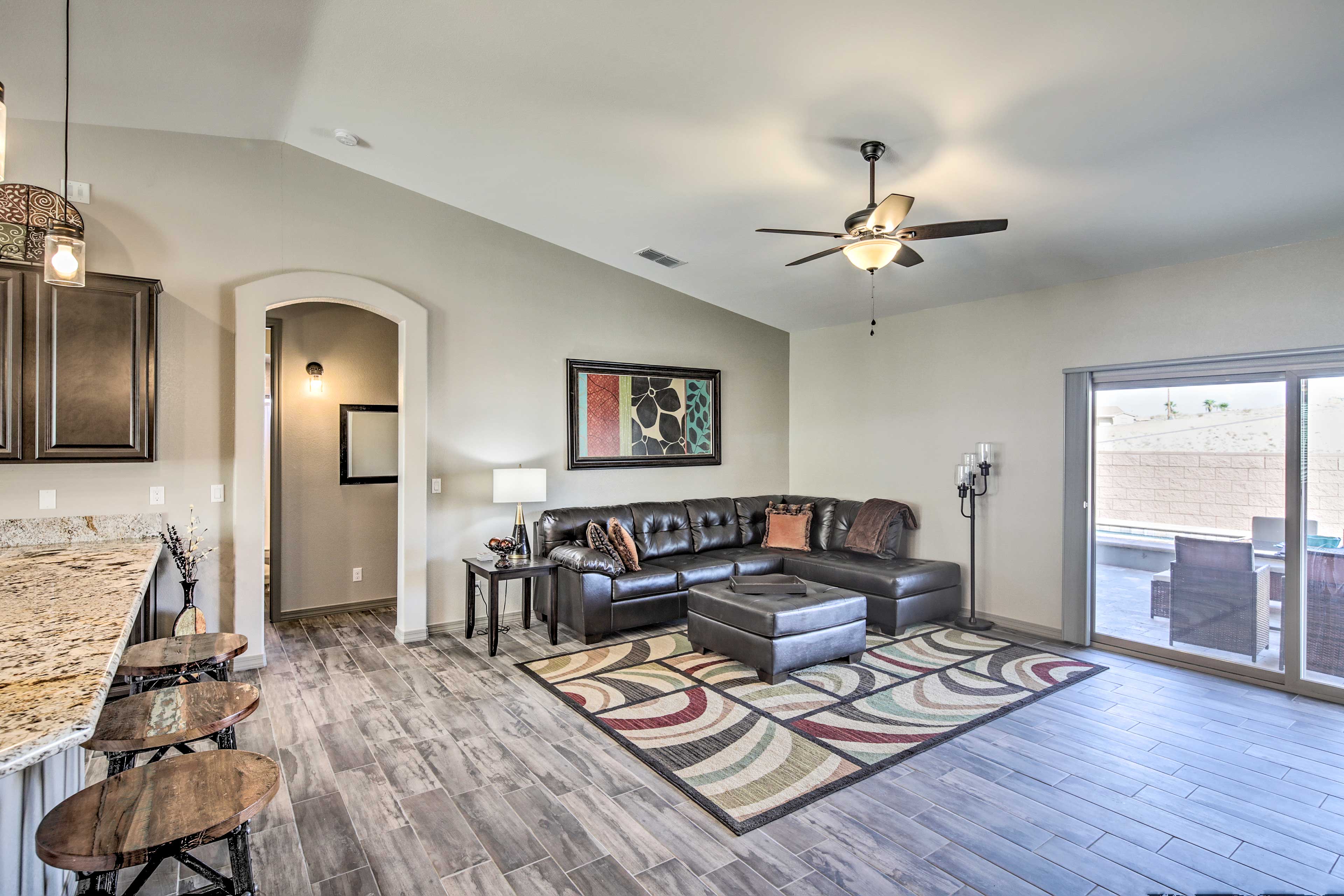 Kick back and relax on the leather sectional sofa.