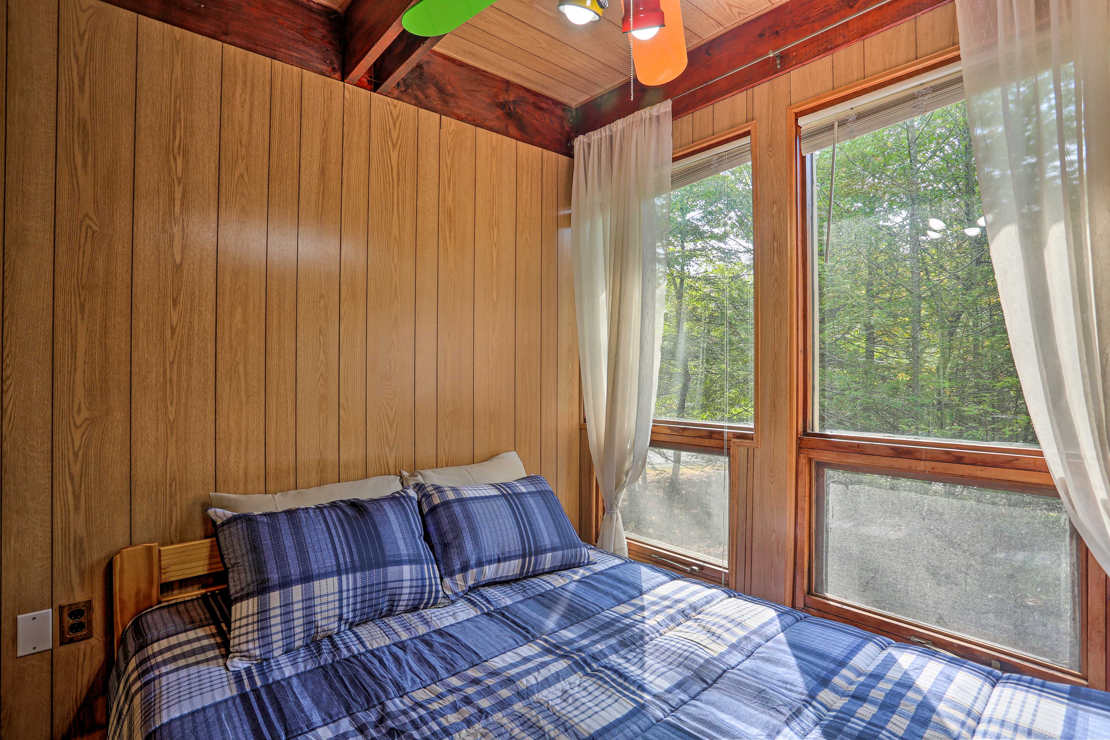 Sleep like a baby in this cozy, cabin-inspired bedroom.