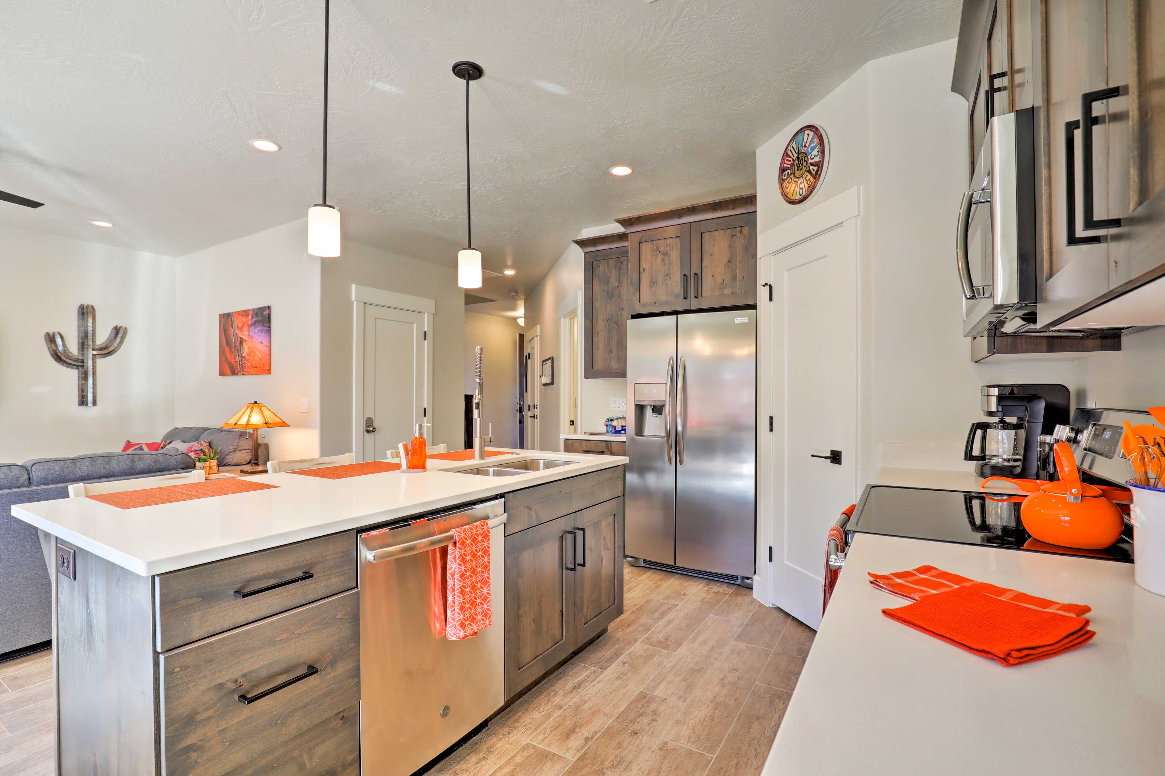 The space comes fully equipped with stainless steel appliances.