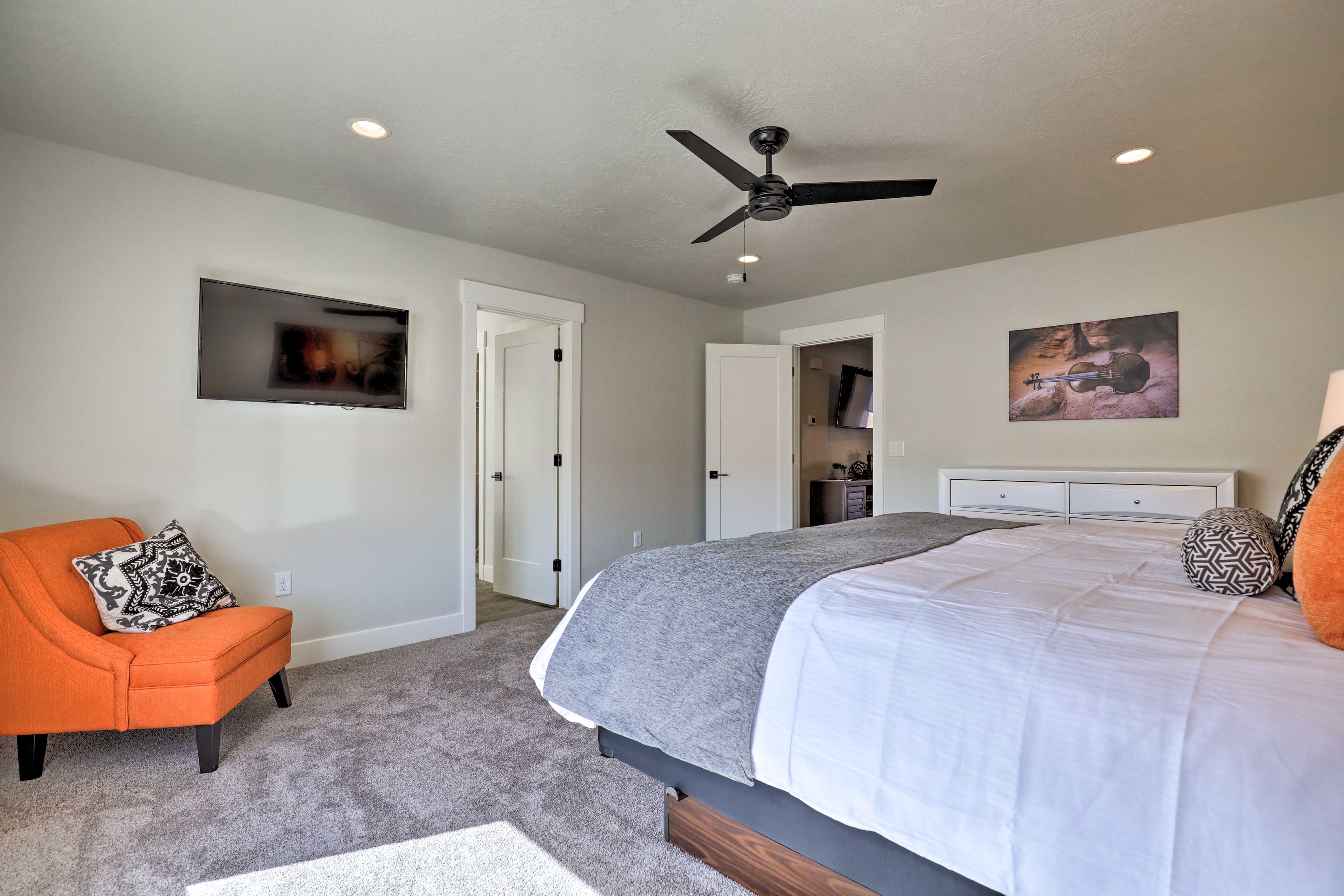The room offers a king bed and Smart TV.