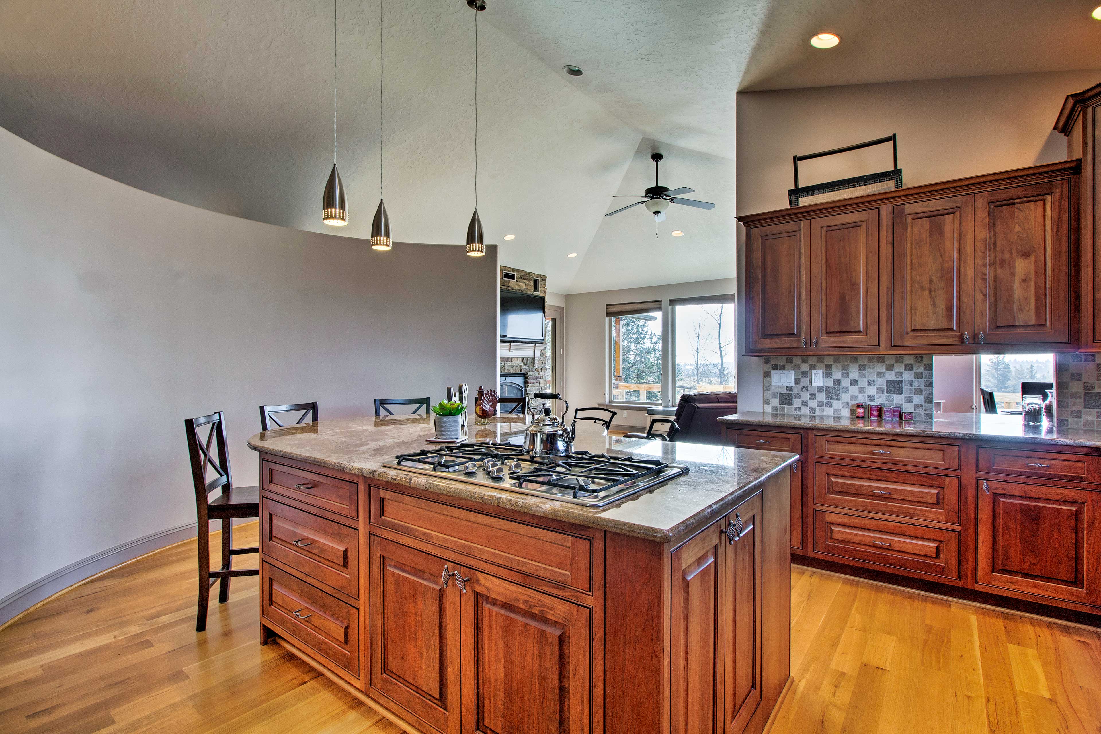 This immaculate, fully equipped kitchen inspires culinary creativity!