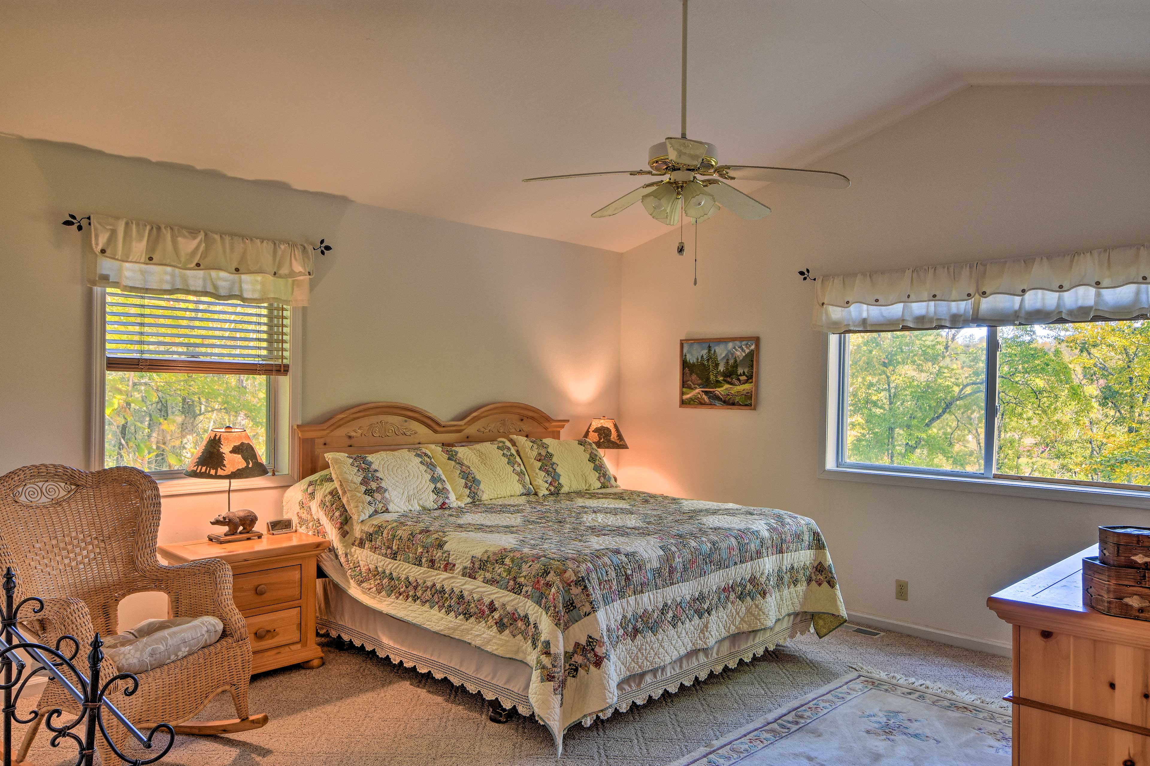 Claim this bedroom's king-sized bed as your own!