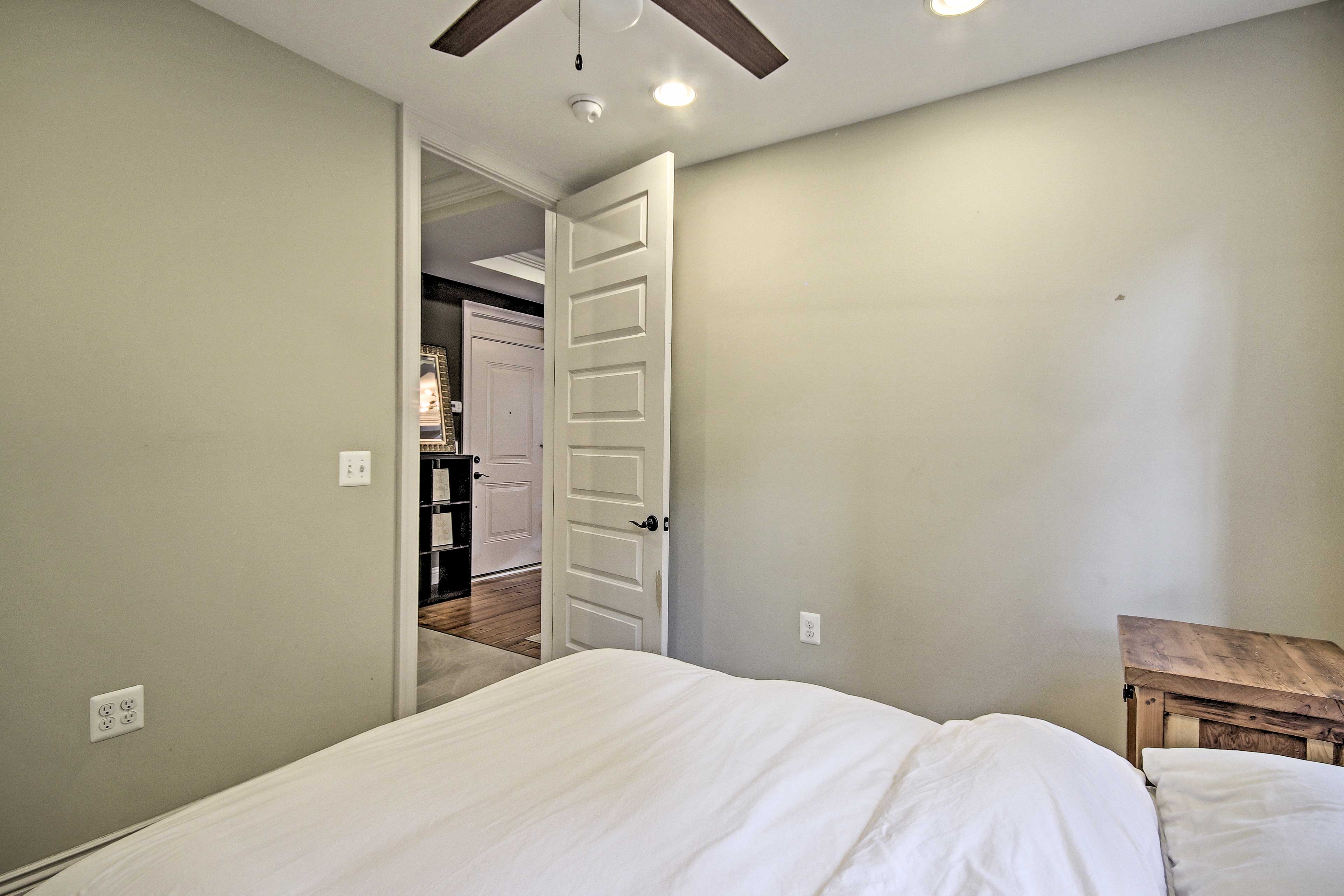 This first bedroom houses a full-sized bed.