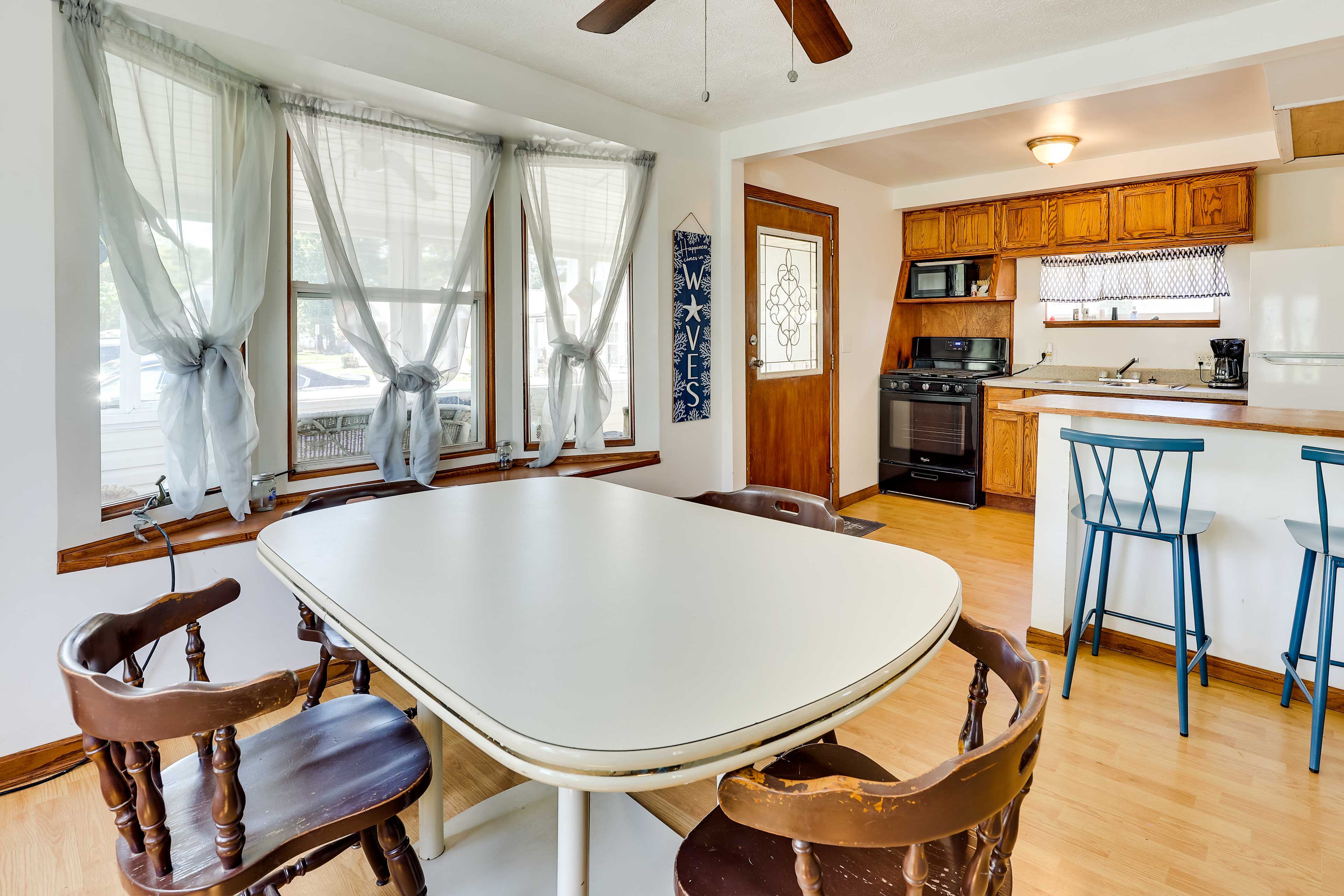 Dining Area | Dishware & Flatware Provided | Window A/C Units