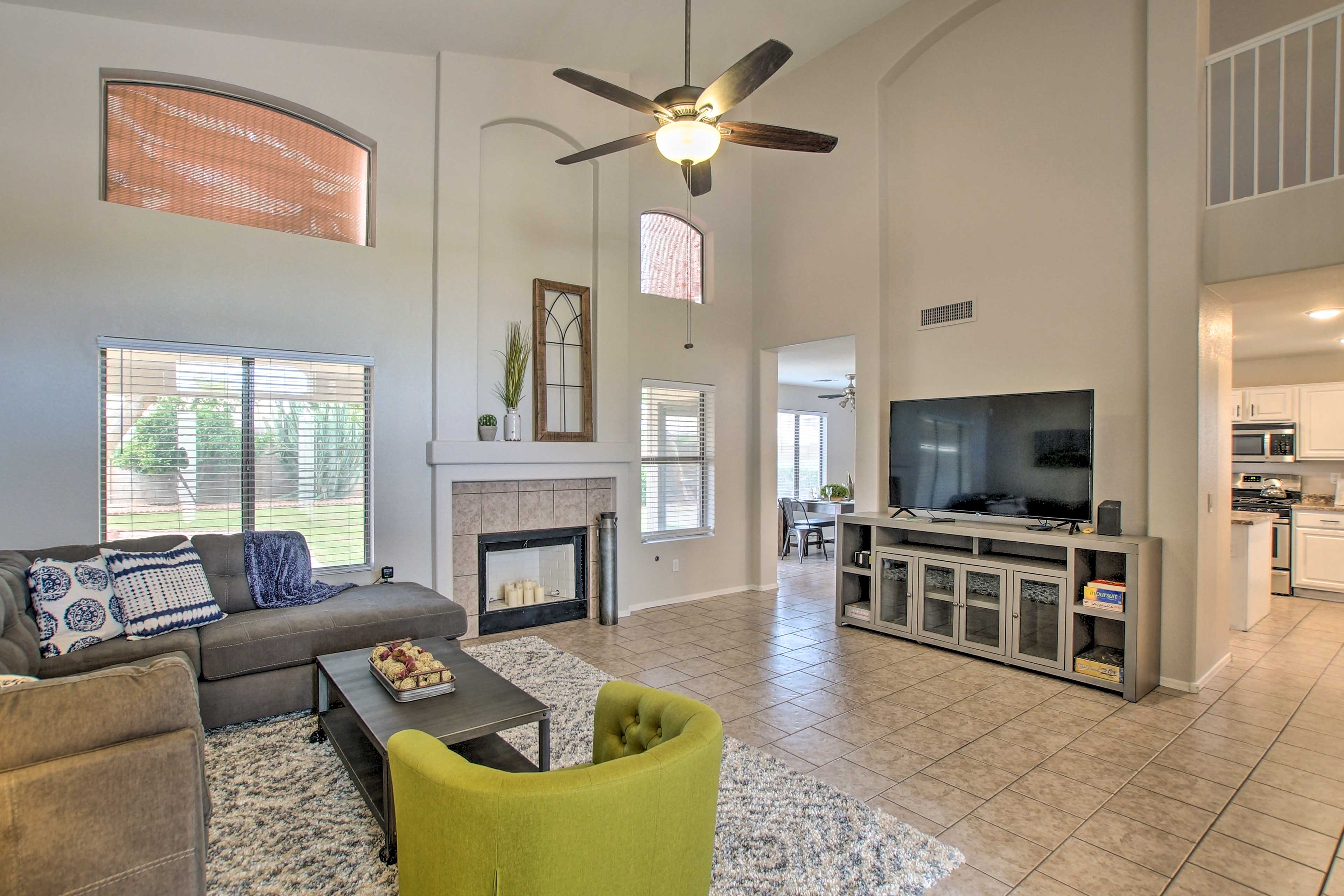 This spacious living room is perfect for catching a Cardinals game on TV.