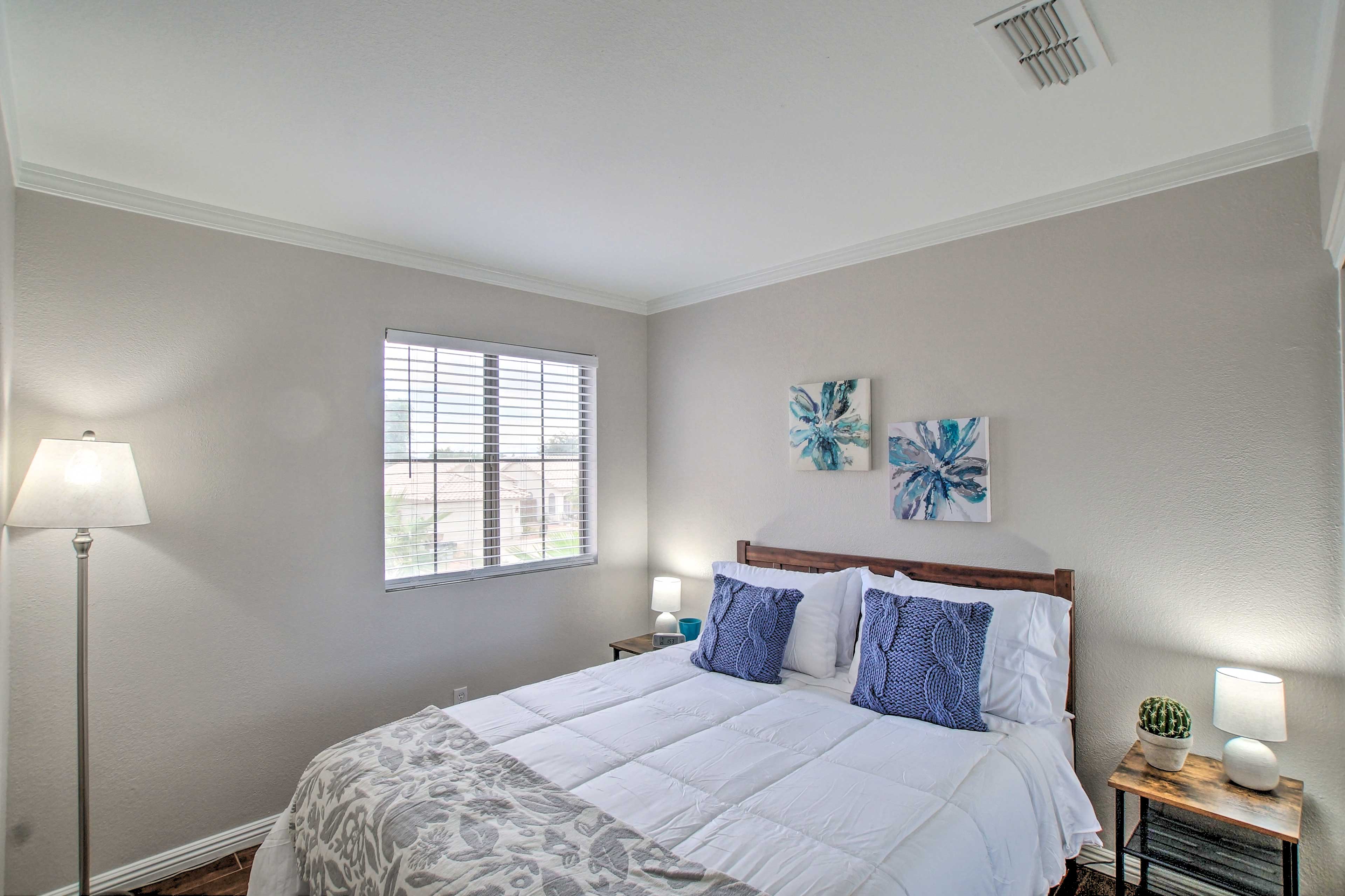 The second bedroom has a queen-sized bed.