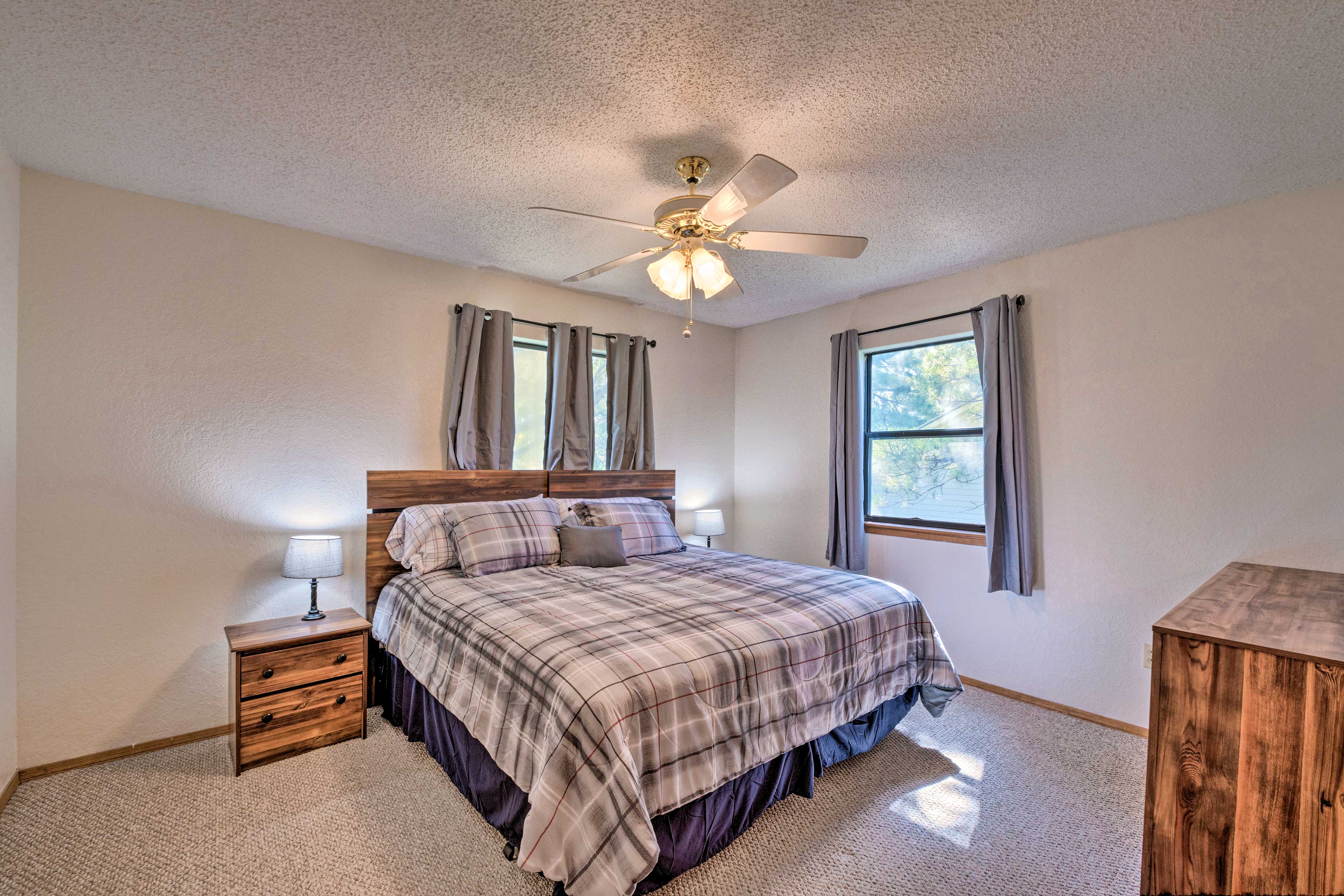 This bedroom includes a king bed.