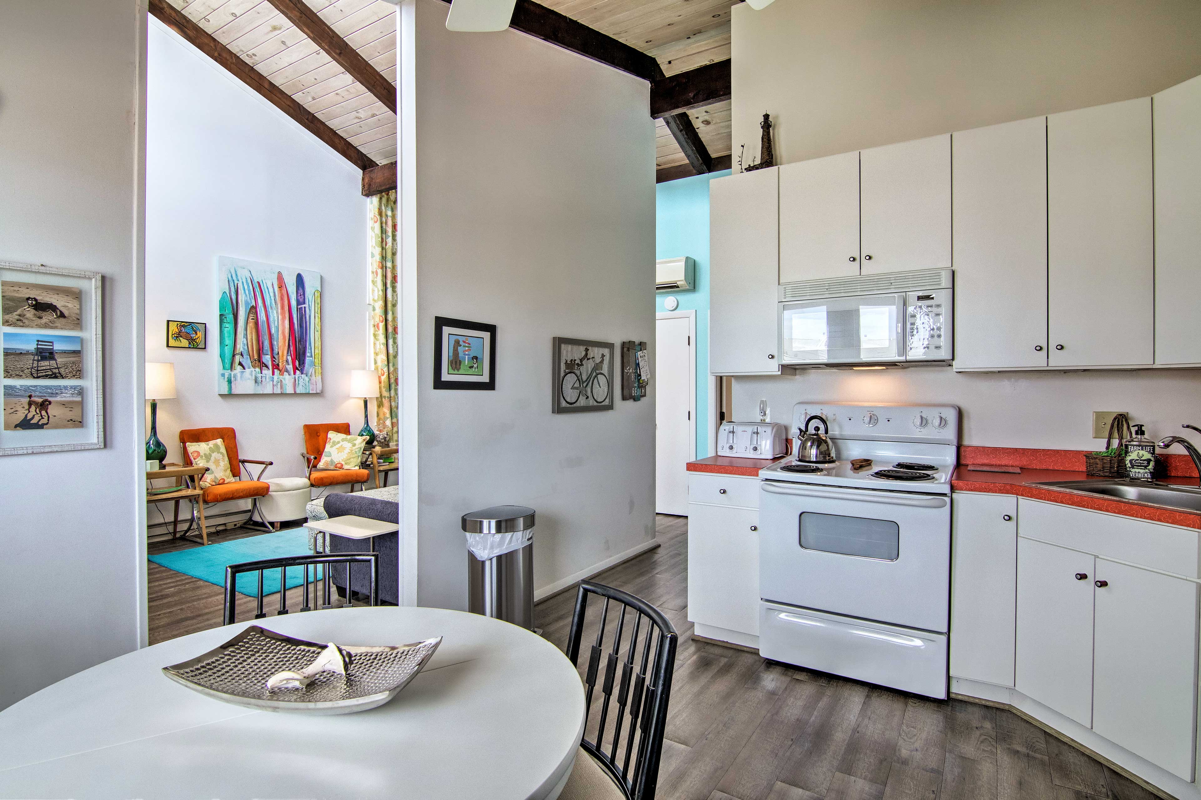 The high-rise ceilings and hardwood floors create an inviting interior.