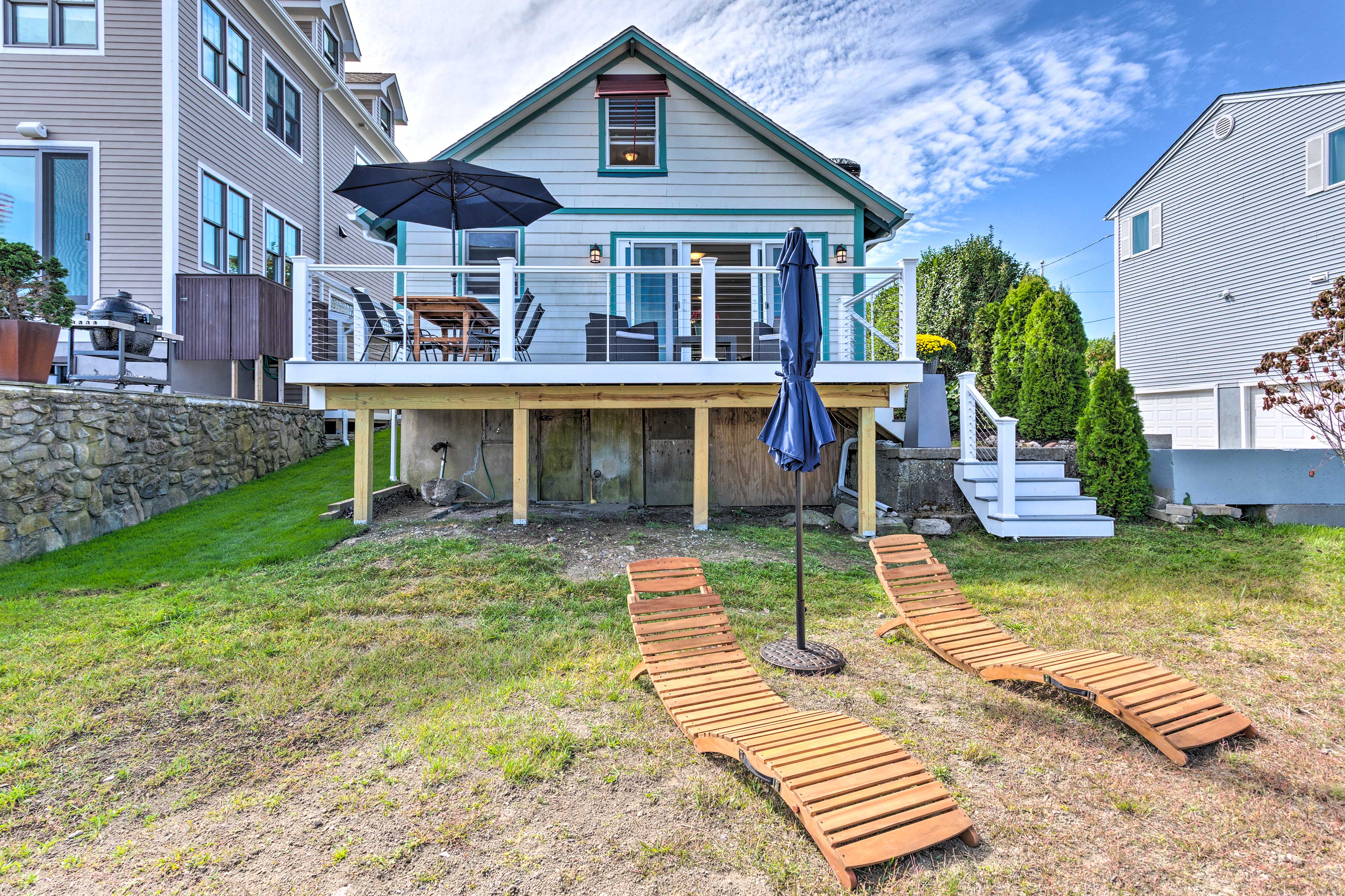 Backyard | Sun Chairs & Umbrellas | Private Deck