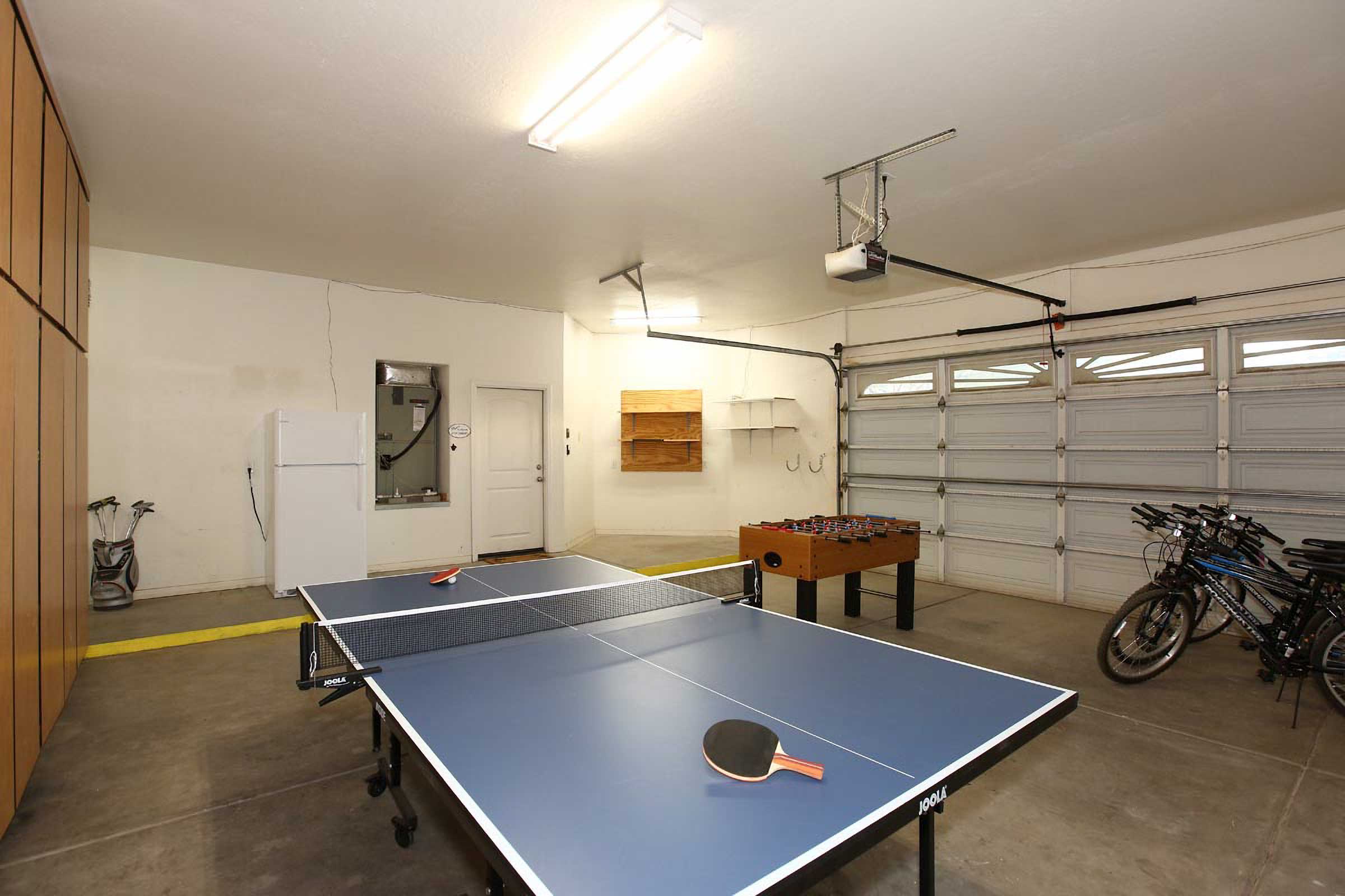 Garage Game Room | Bikes | Ping Pong & Foosball Tables