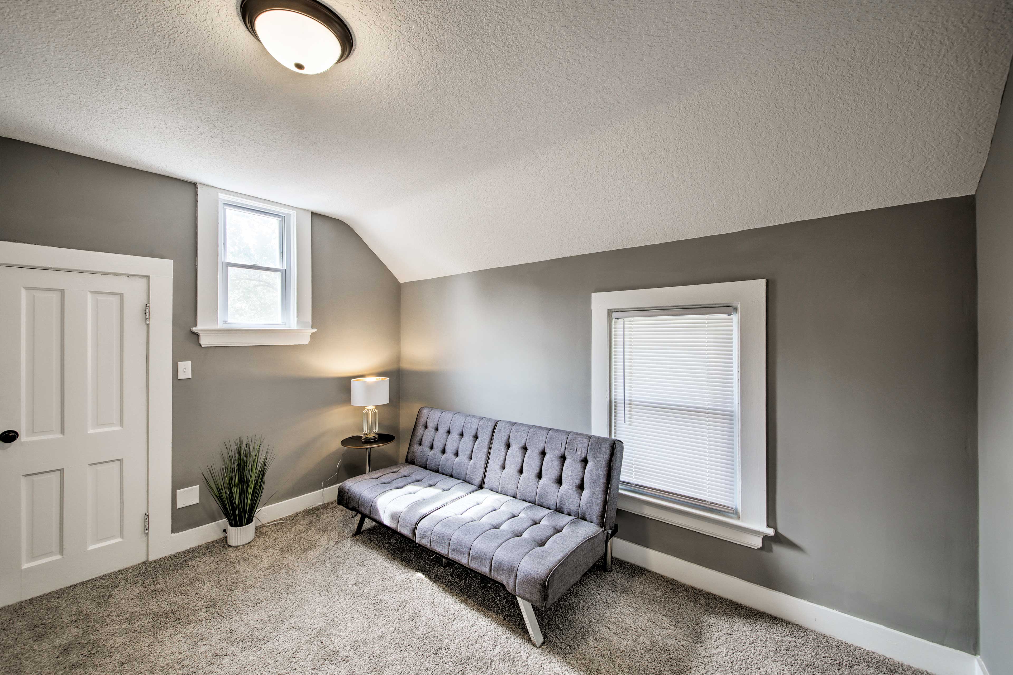 The second bedroom features a futon.