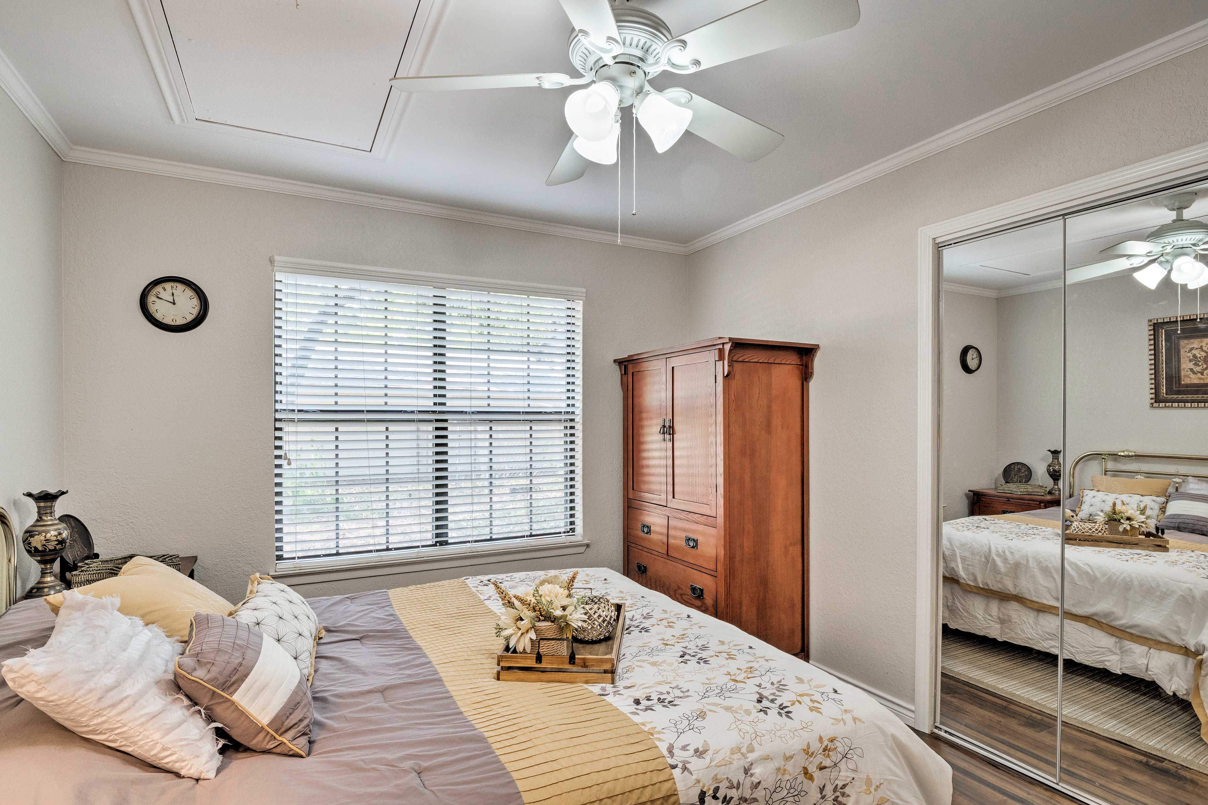 The well-appointed room has a large closet and wardrobe.