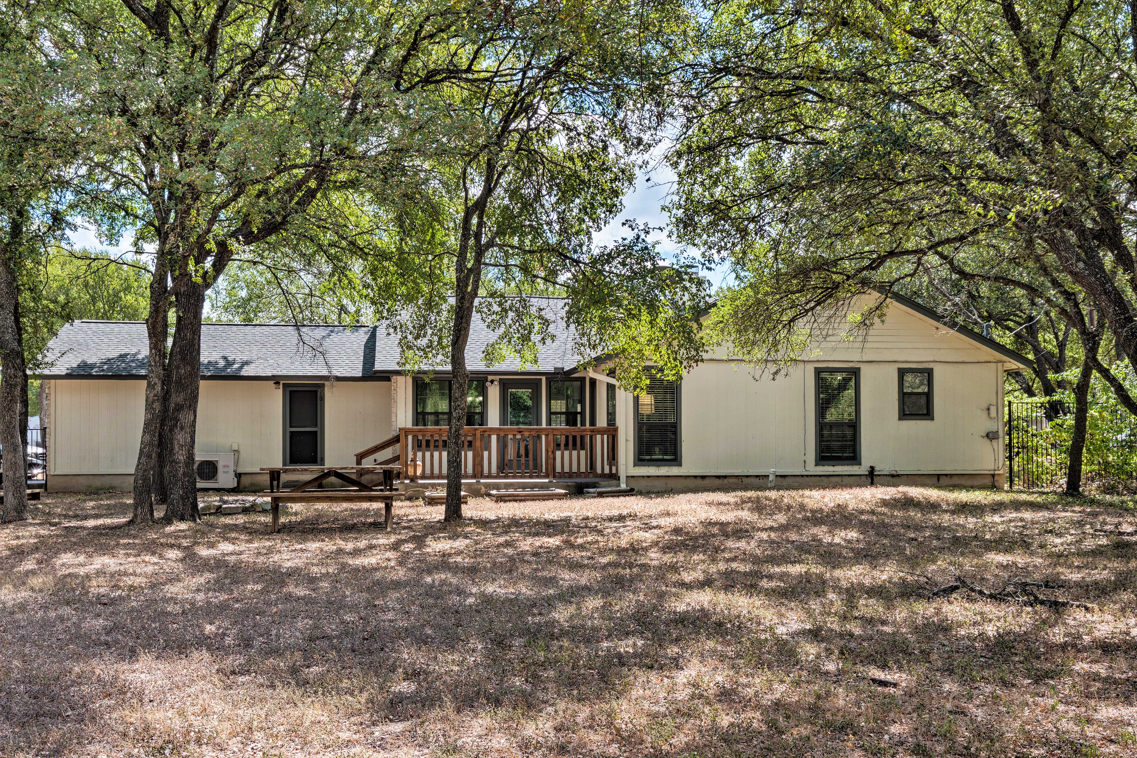 The large yard has plenty of room for activity.