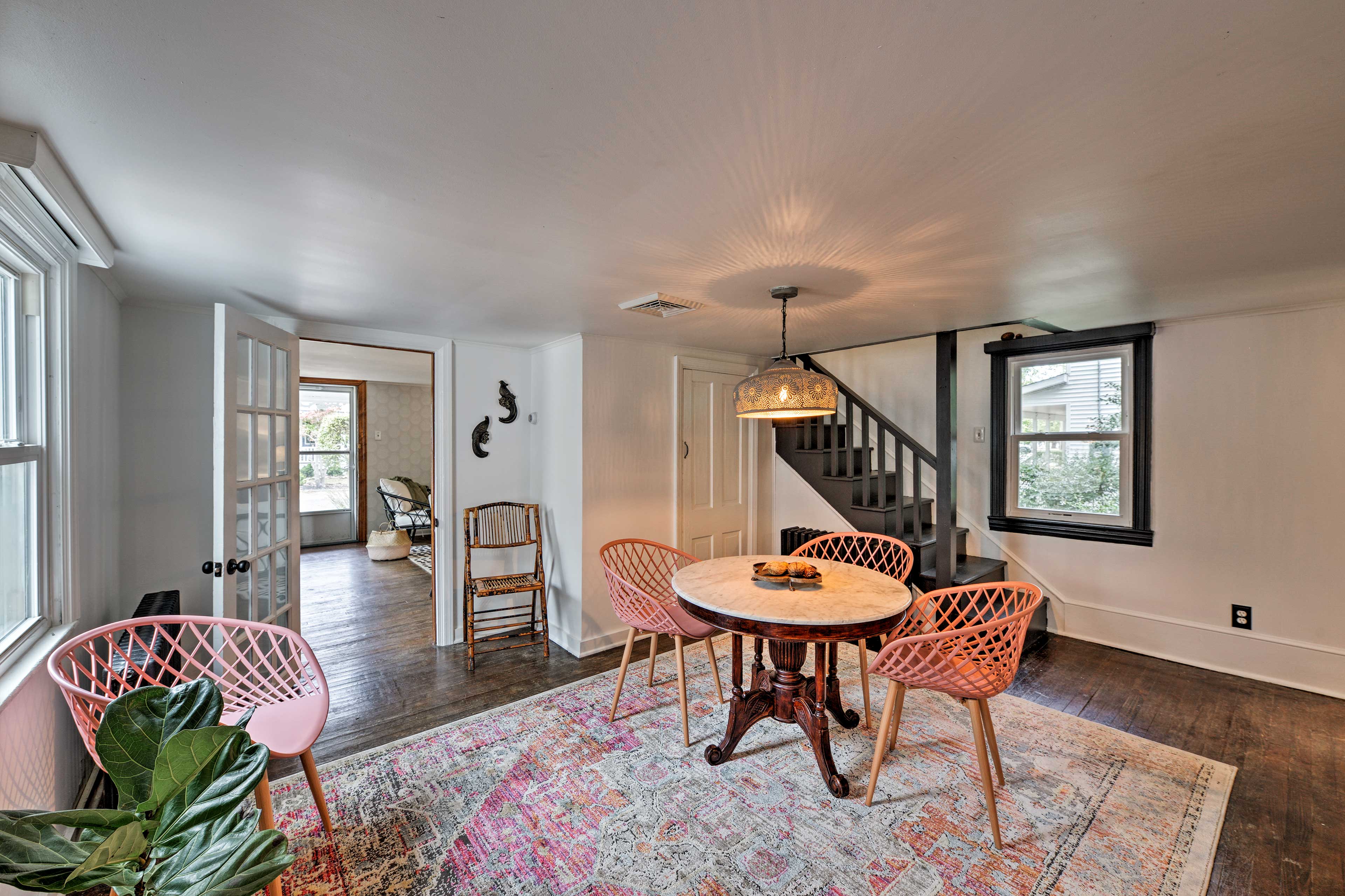 Pops of pink breathe new life into the original hardwood floors.