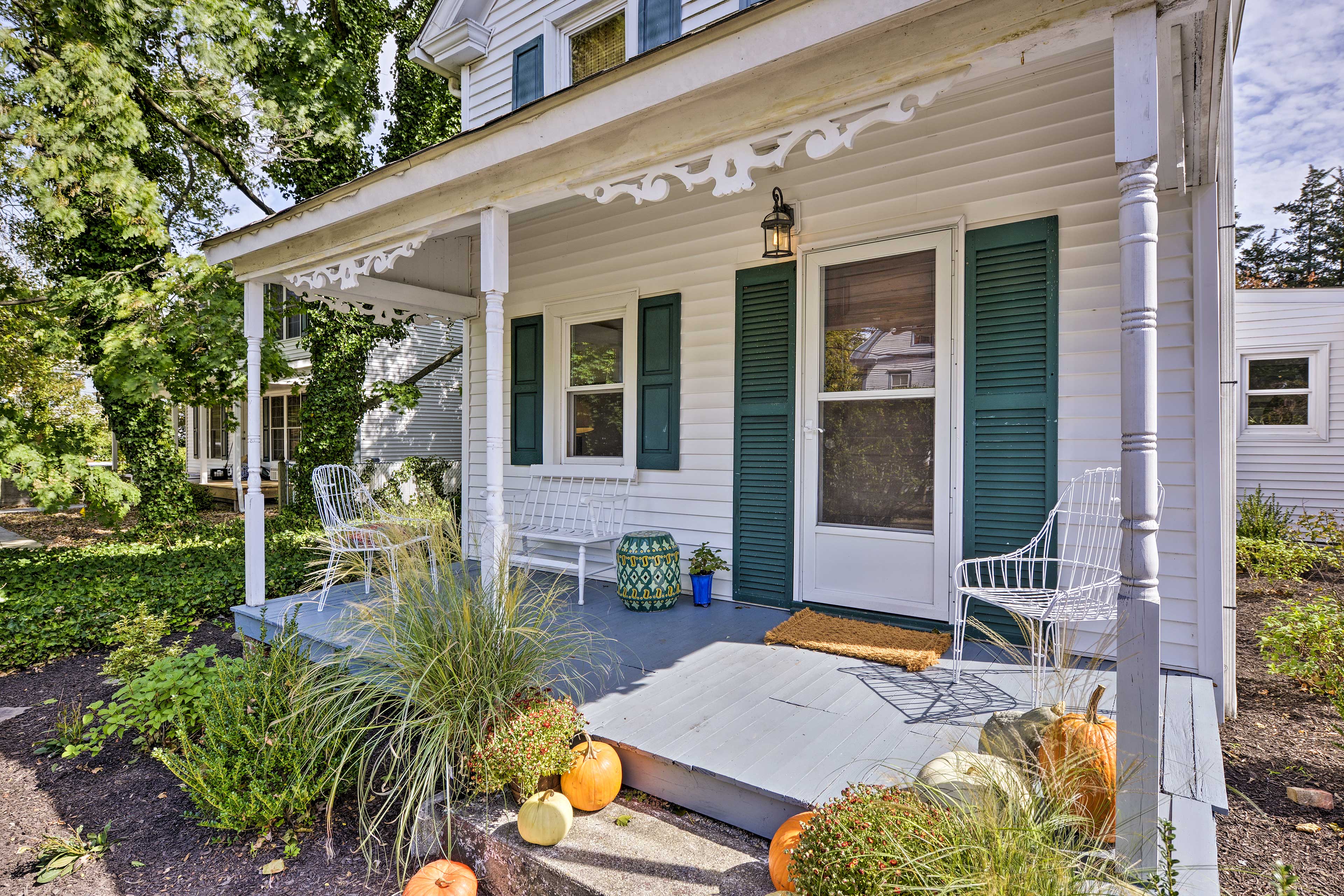 Sip morning coffee and evening nightcaps on the covered front porch.