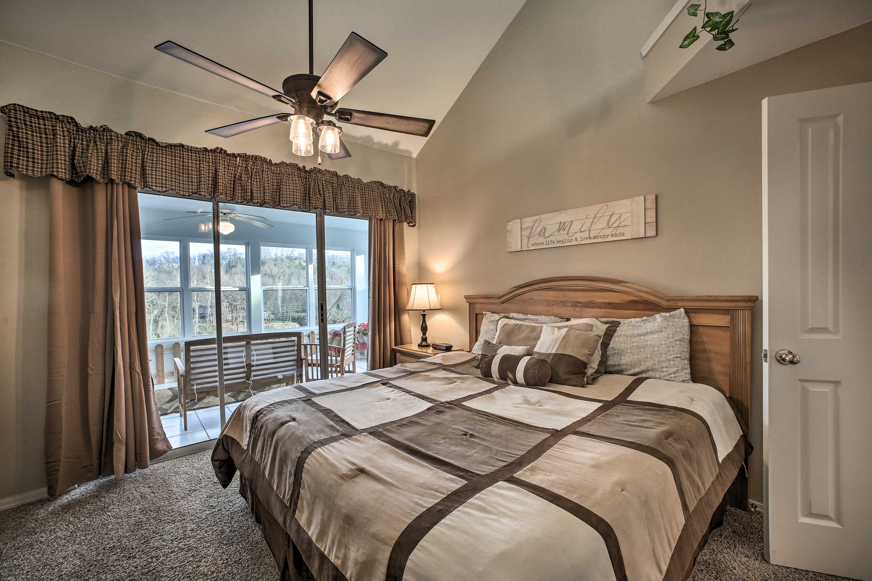 This bedroom features private access to the sunroom.