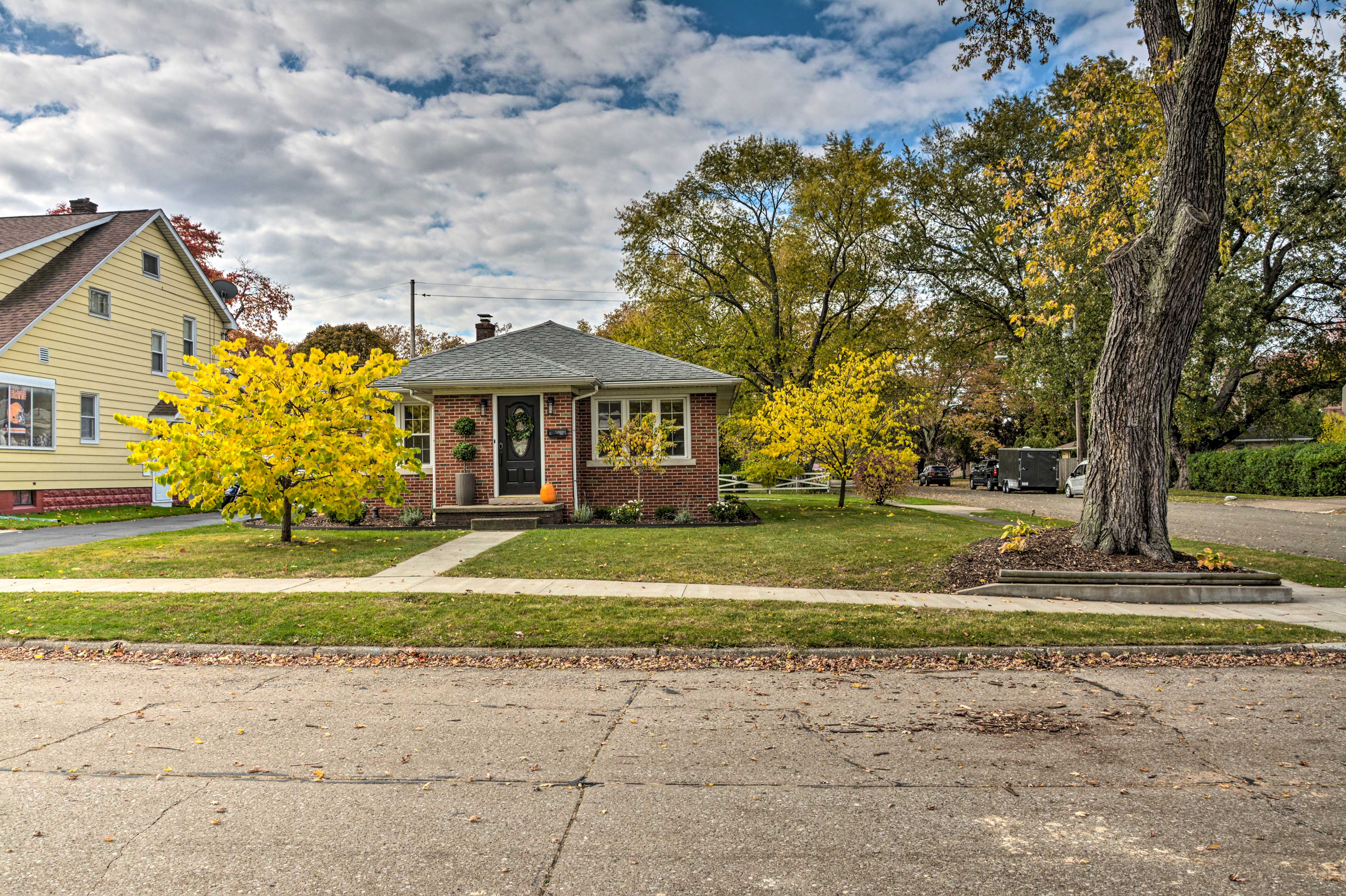 This corner home offers plenty of green space.