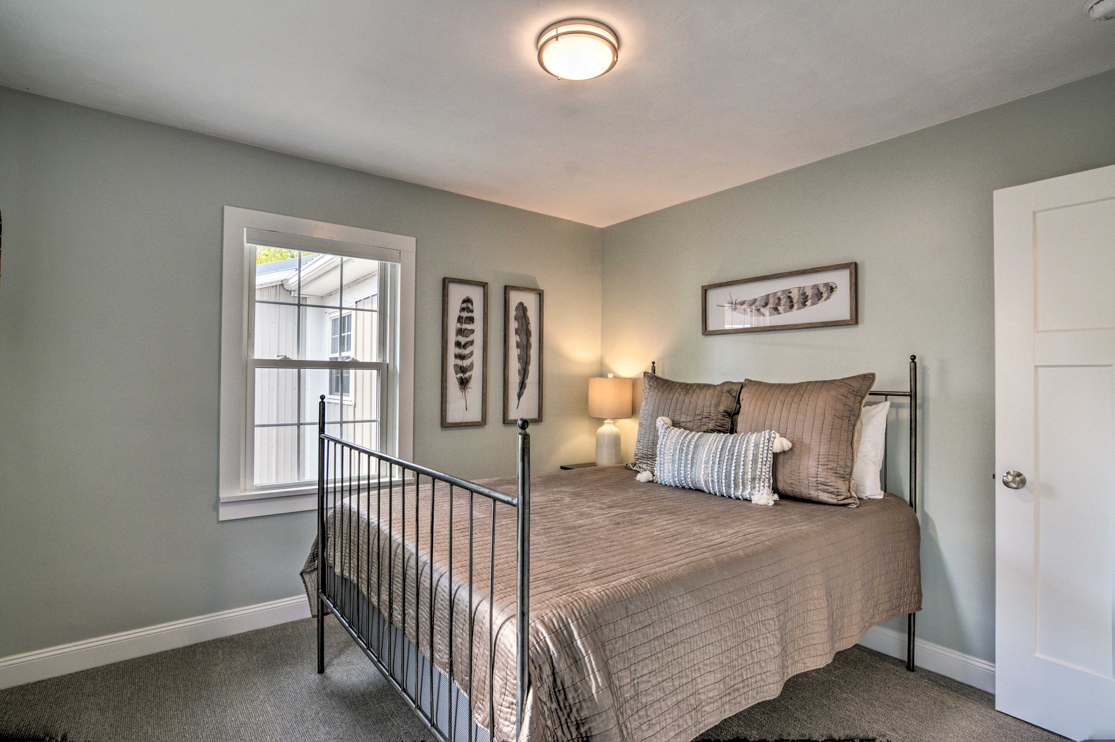 Two guests can cozy up in this queen bed!