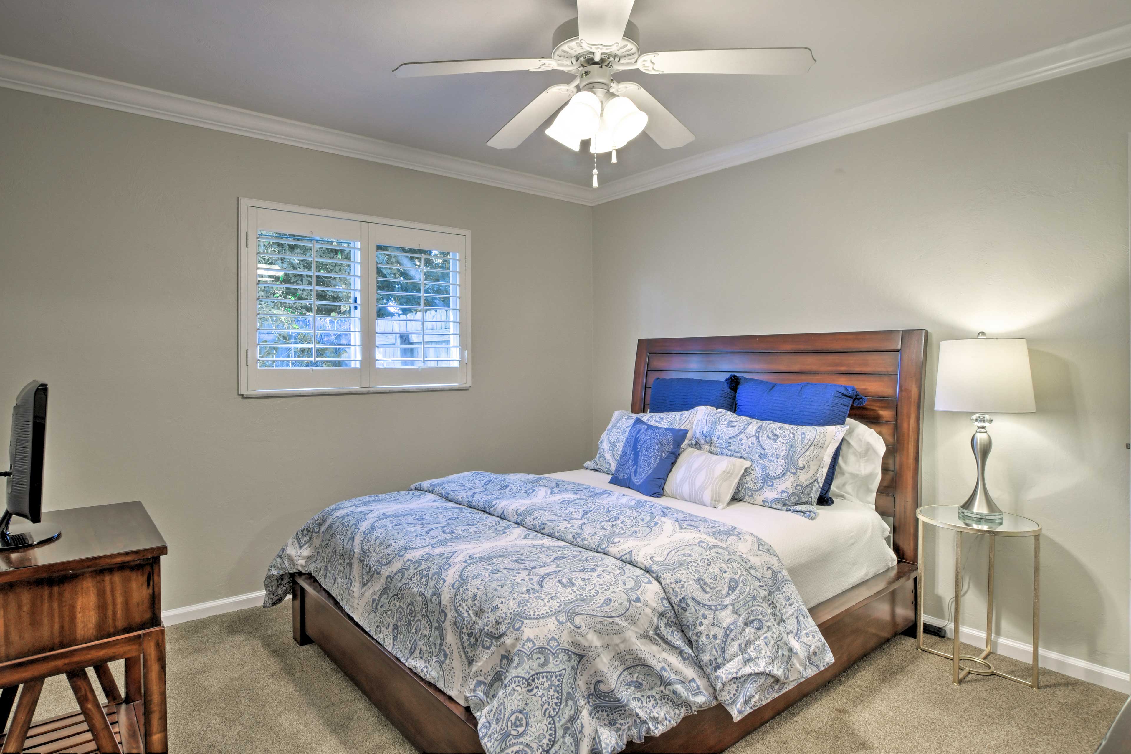 The second bedroom houses a queen bed.