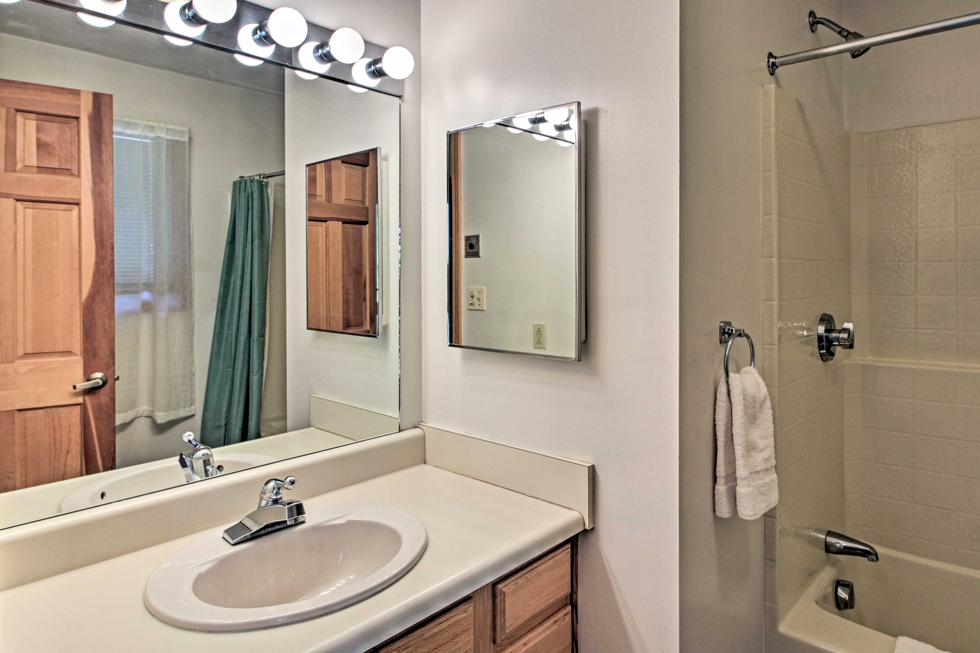 Rinse off in the second bathroom's shower/tub combo.