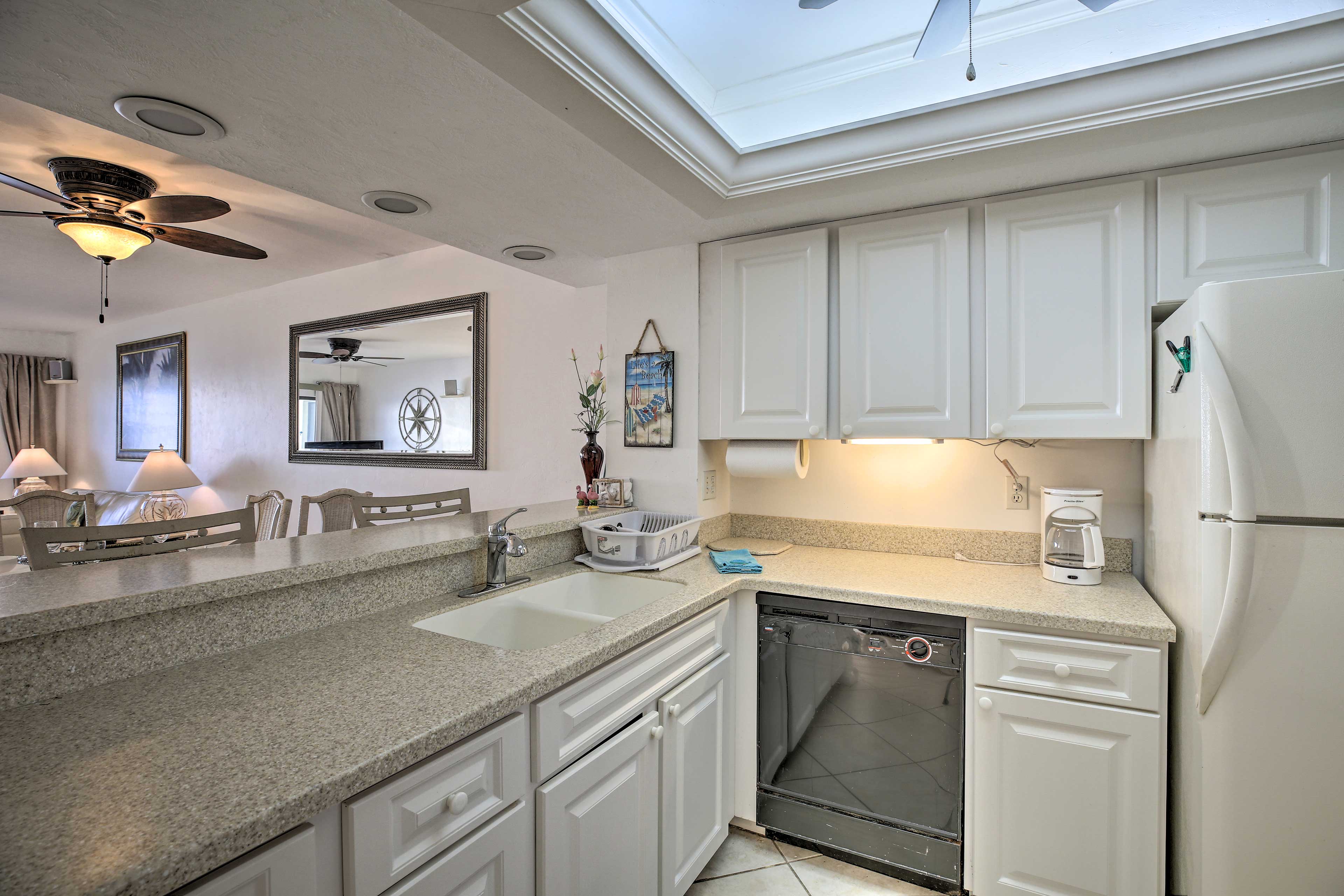 This kitchen features updated appliances and ample counter space.