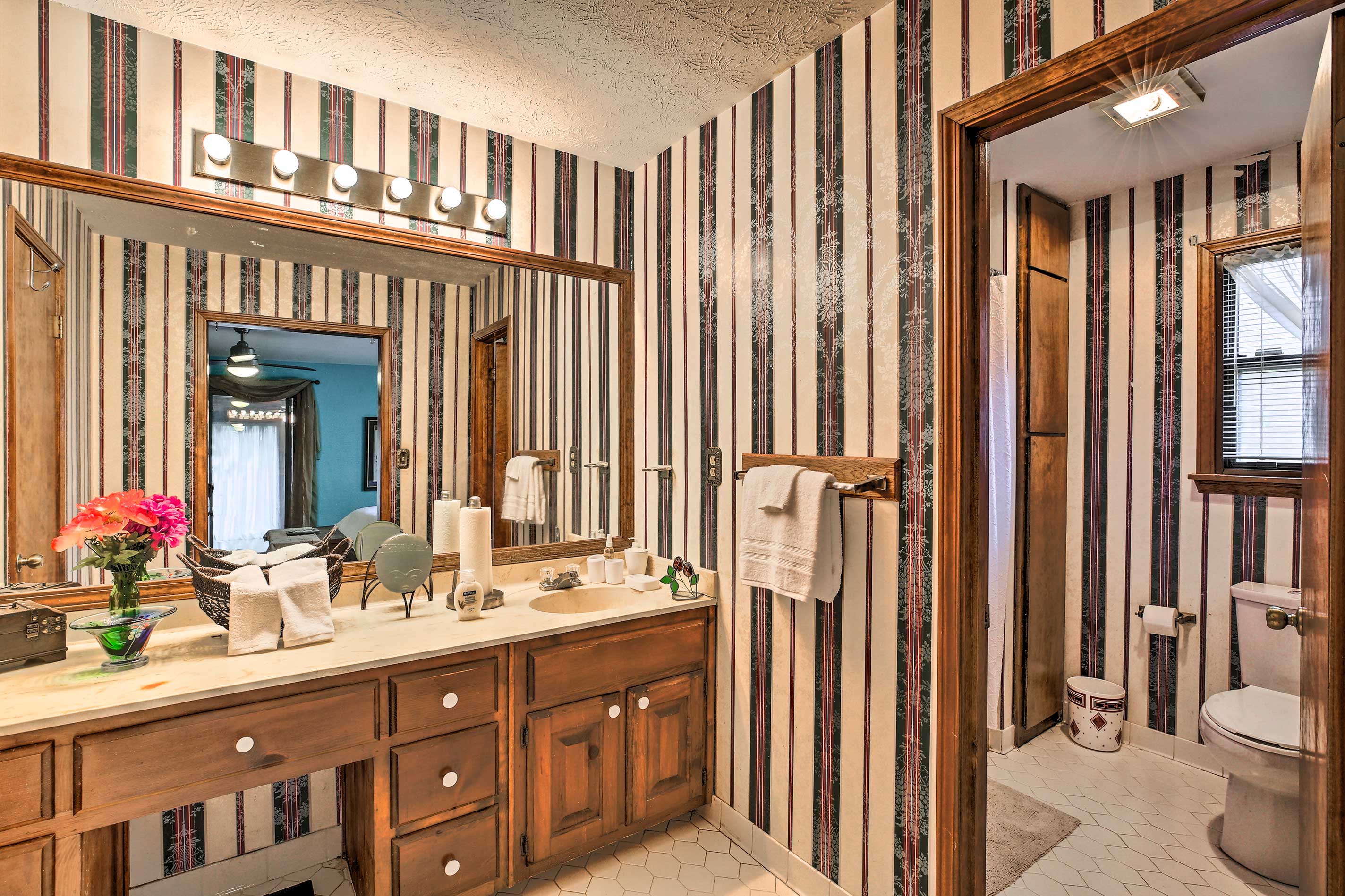 Prepare for the day in front of this long vanity.