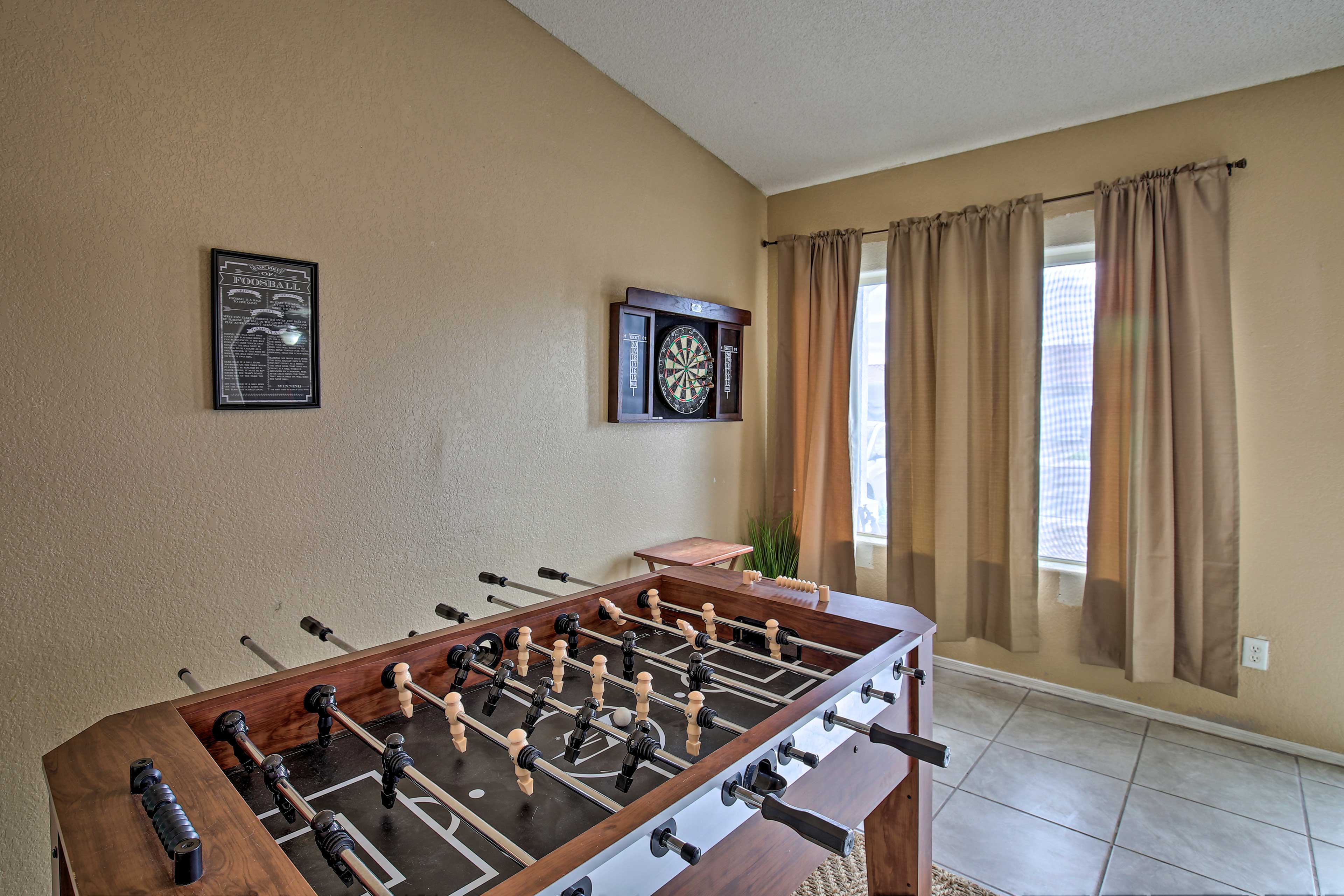 Challenge your travel companions to darts and foosball.