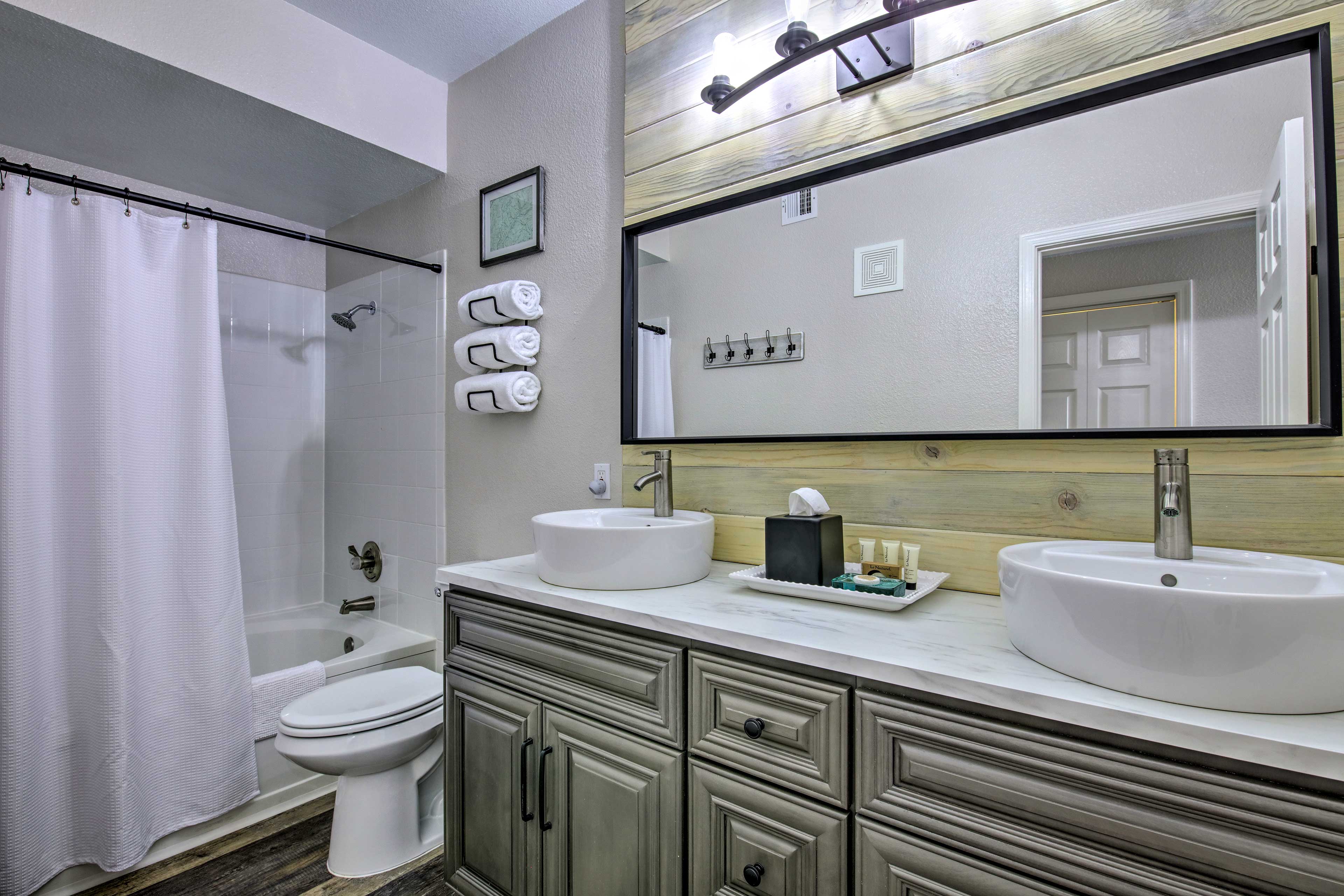 A large updated bathroom can be found in the hallway when you want to freshen up