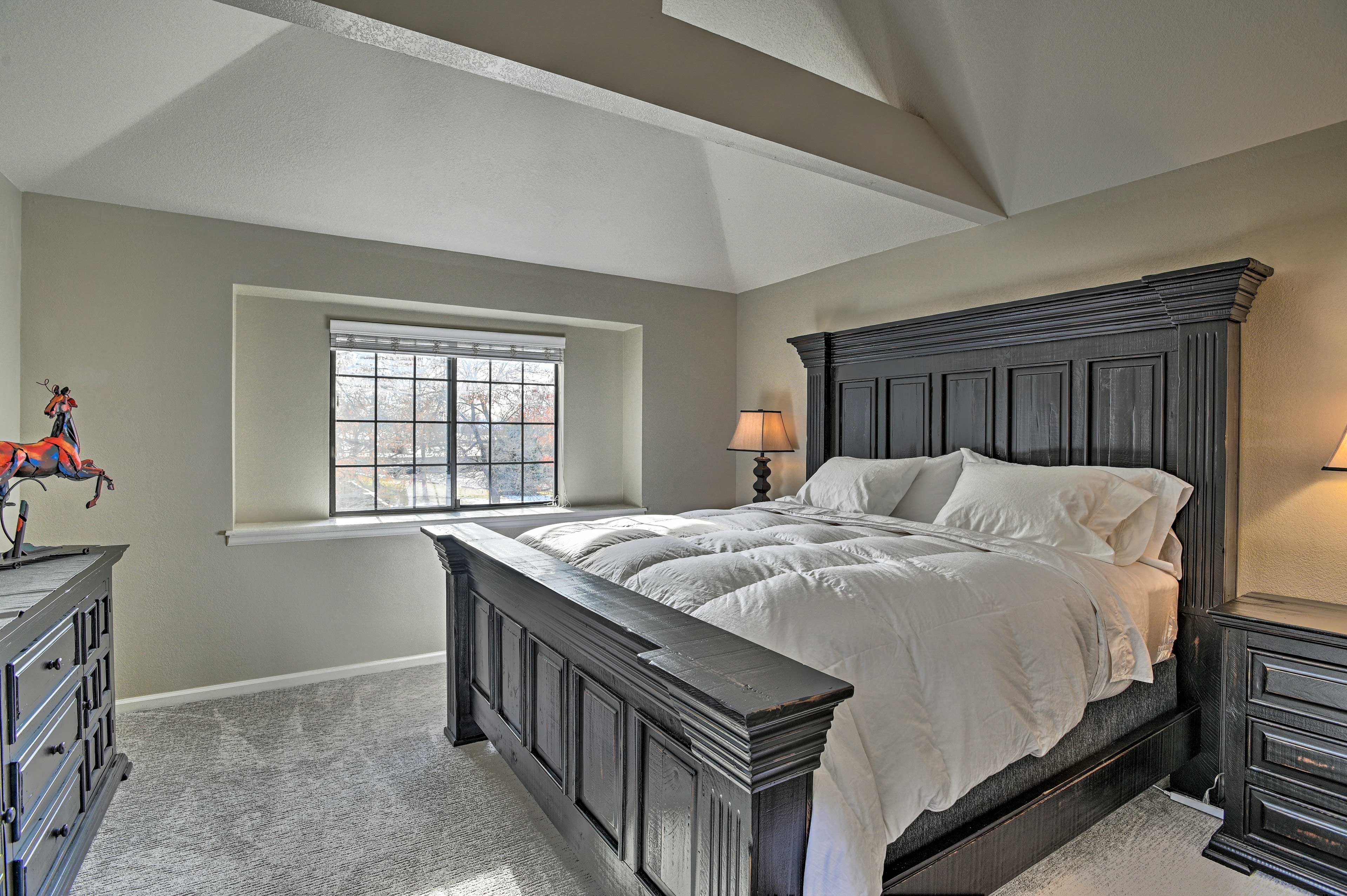 The main bedroom boasts a king-sized bed.