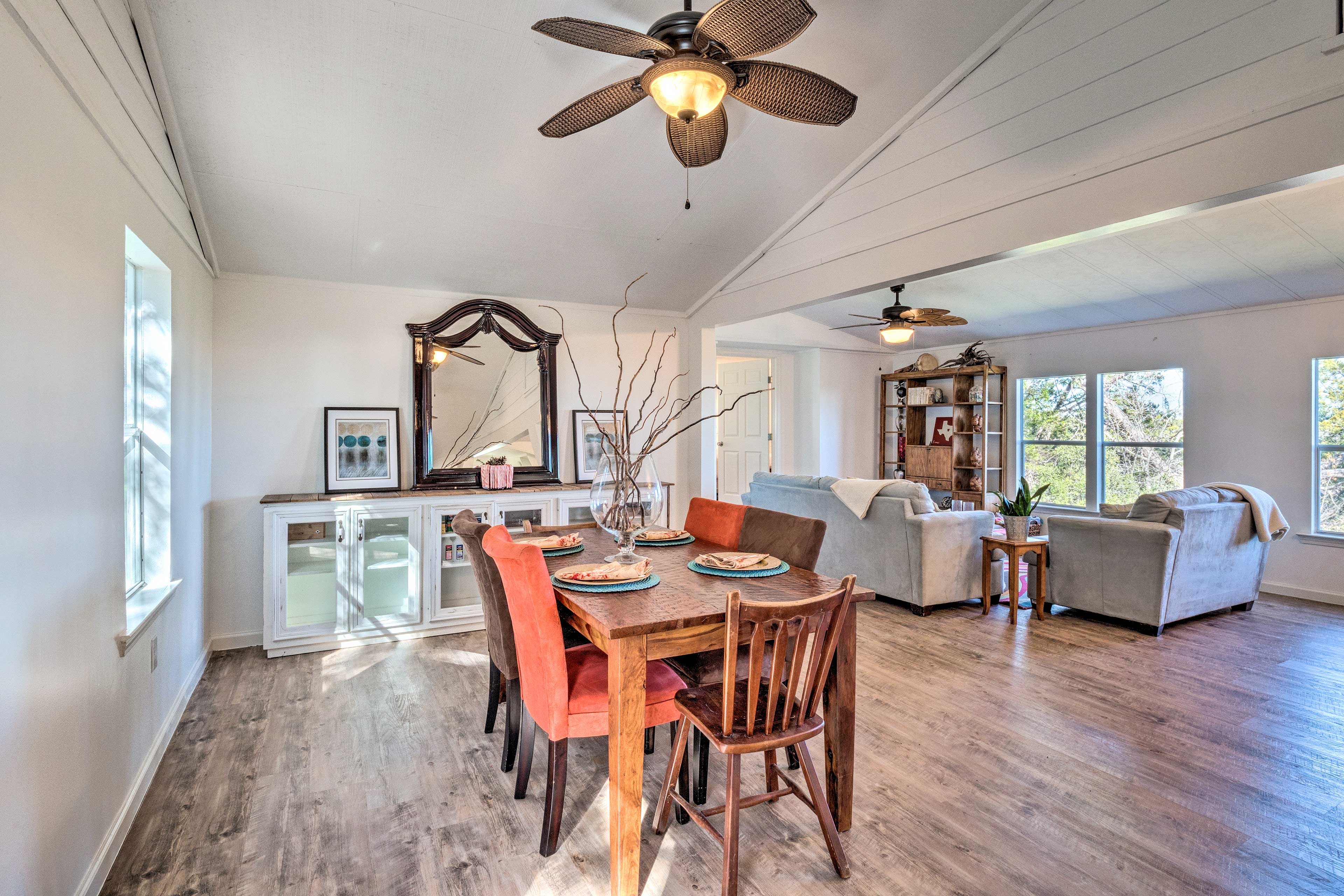 The light and airy interior features vaulted ceilings and hardwood floors.