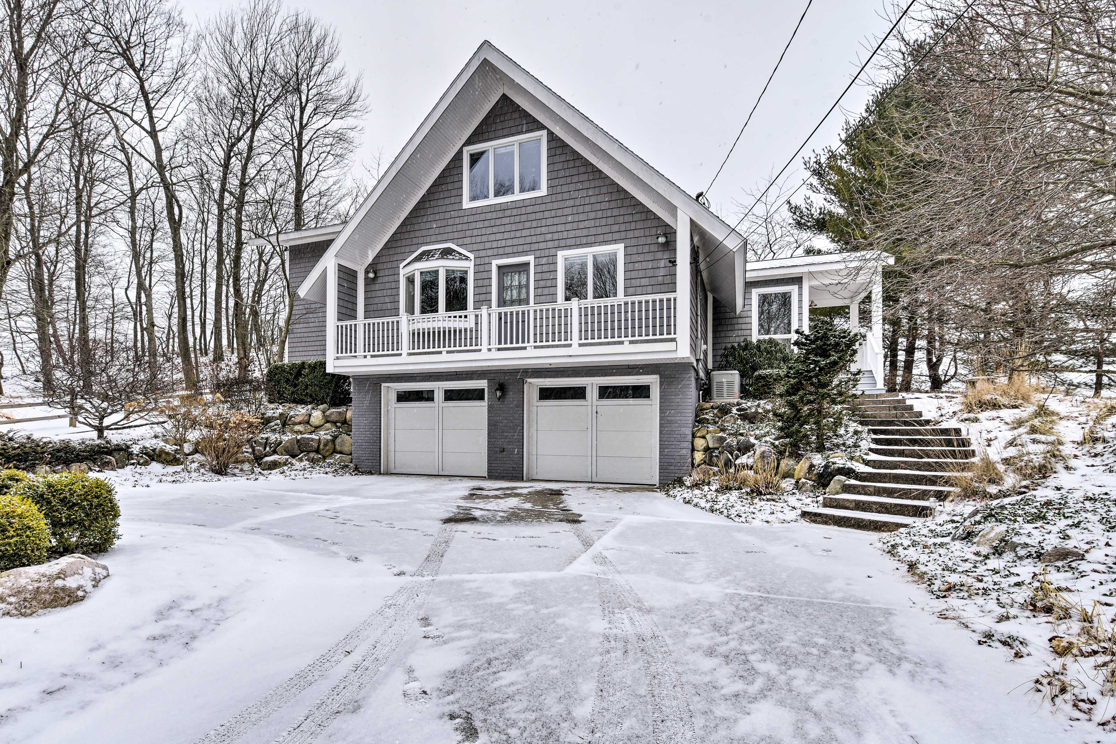 There is parking for 4 vehicles in the garage and driveway.