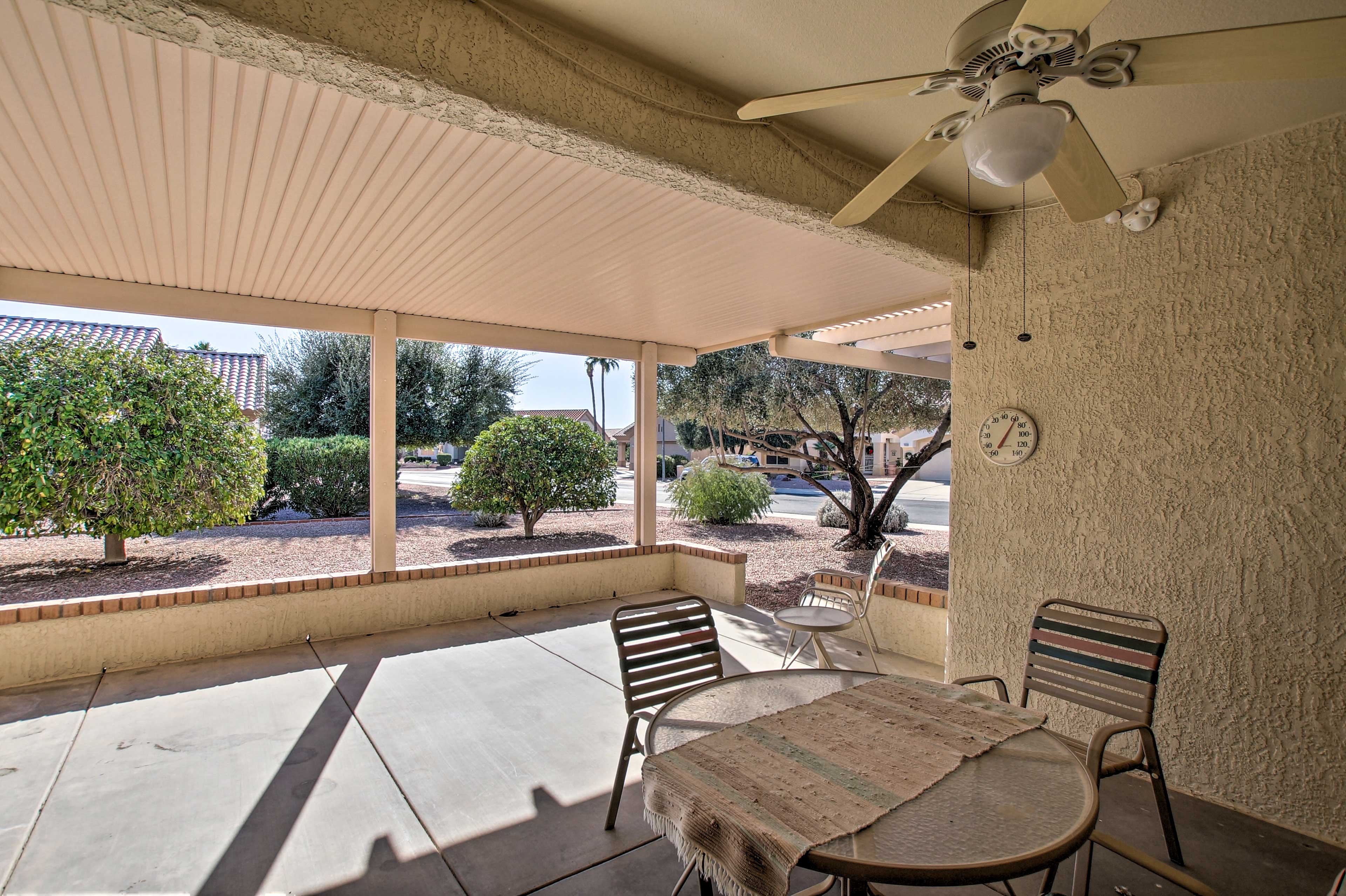 Have a meal on the outside on the outdoor dining table.