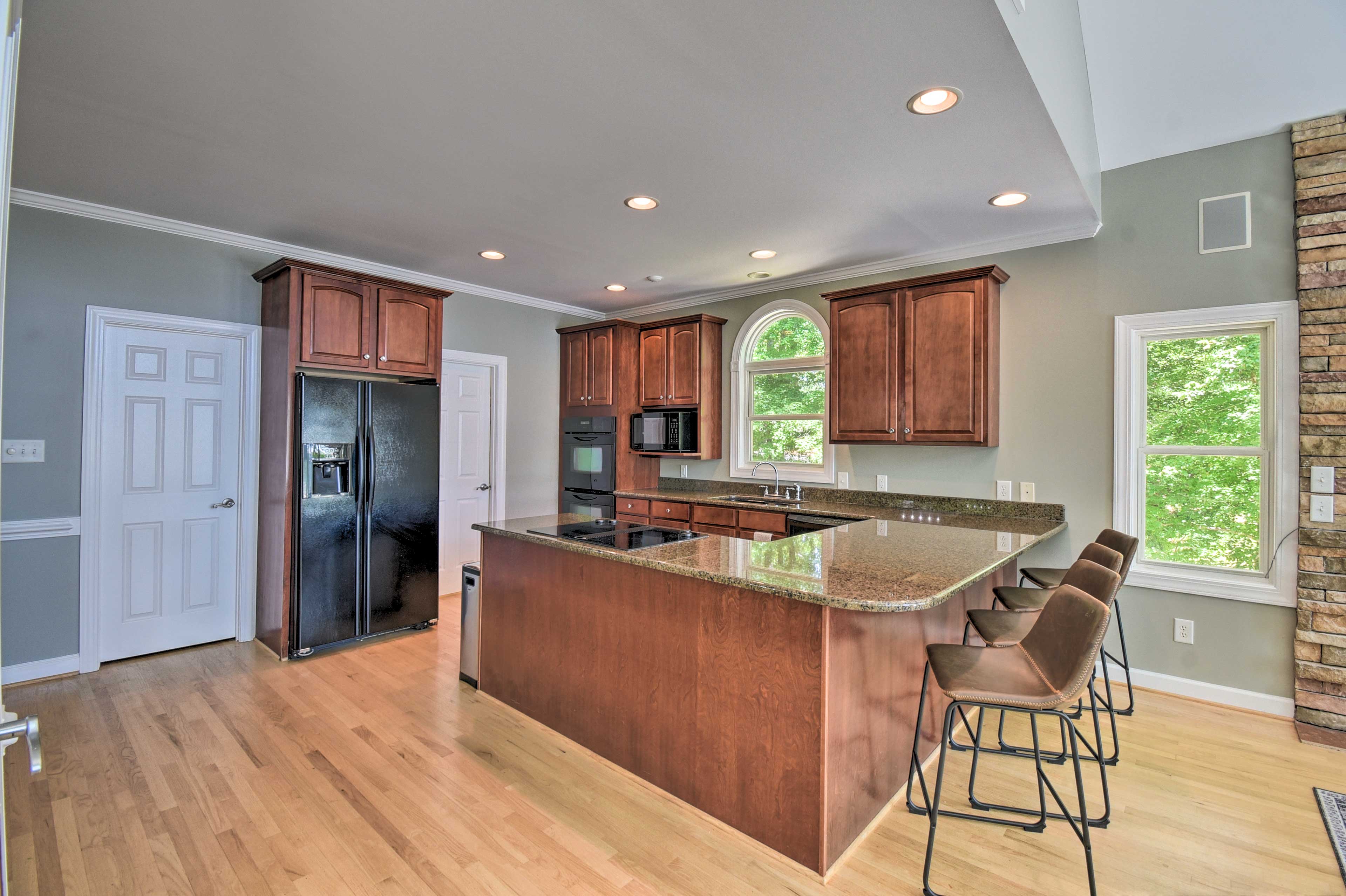 The living area leads into the kitchen.