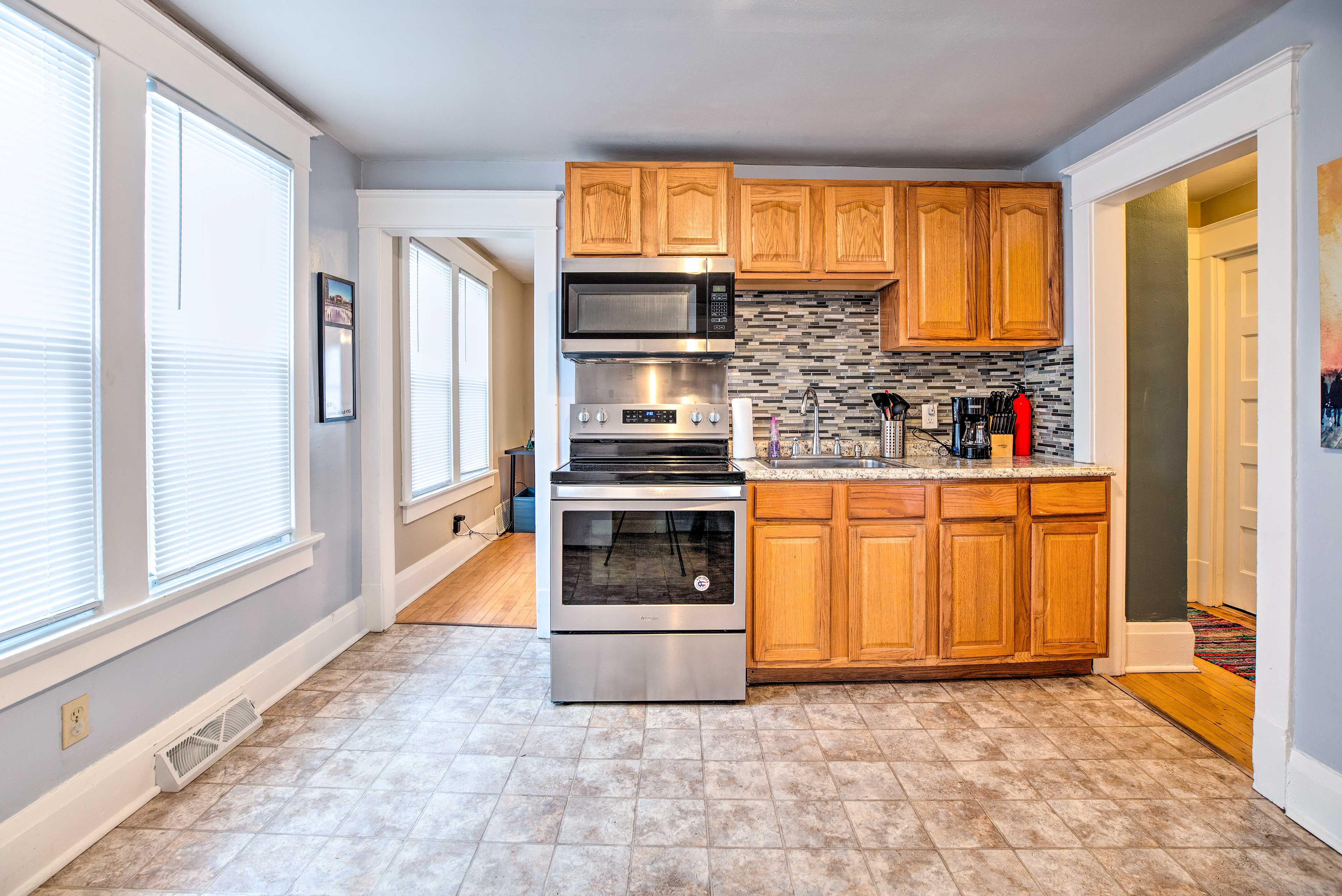 The dining room leads into the kitchen.