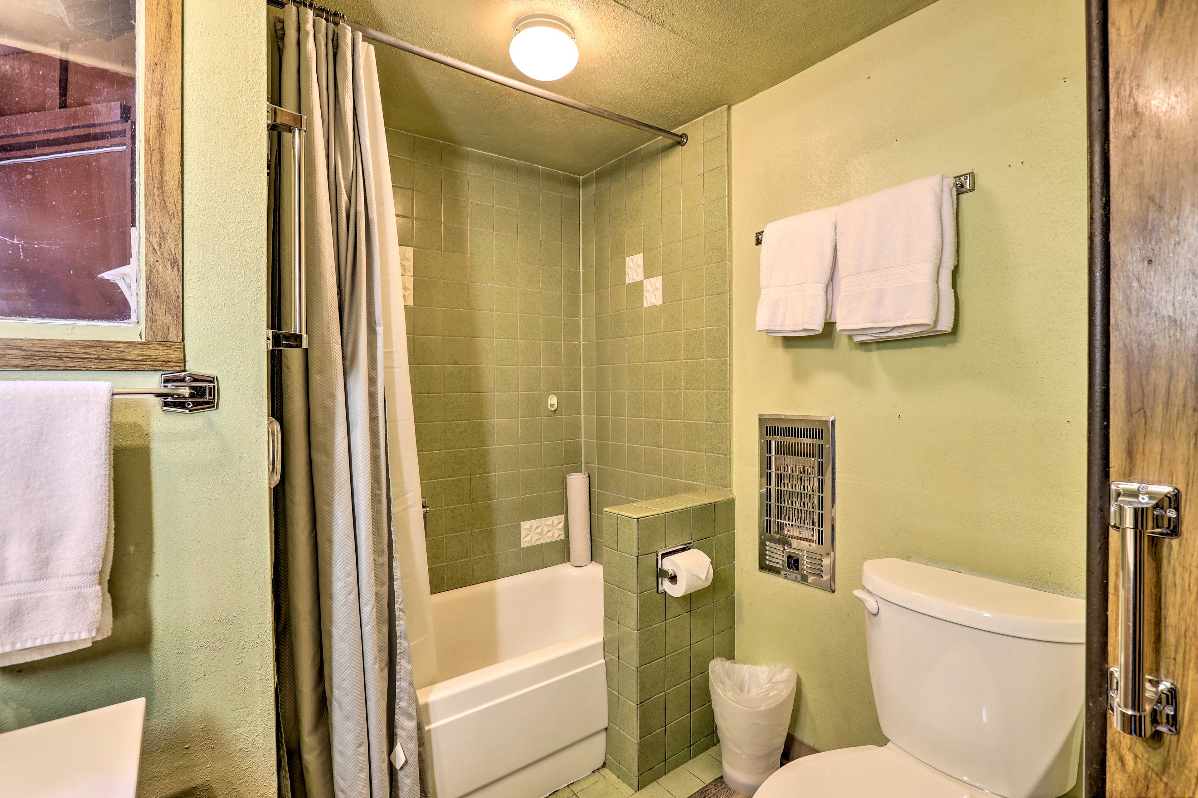 The second full bathroom features a shower/tub combo.