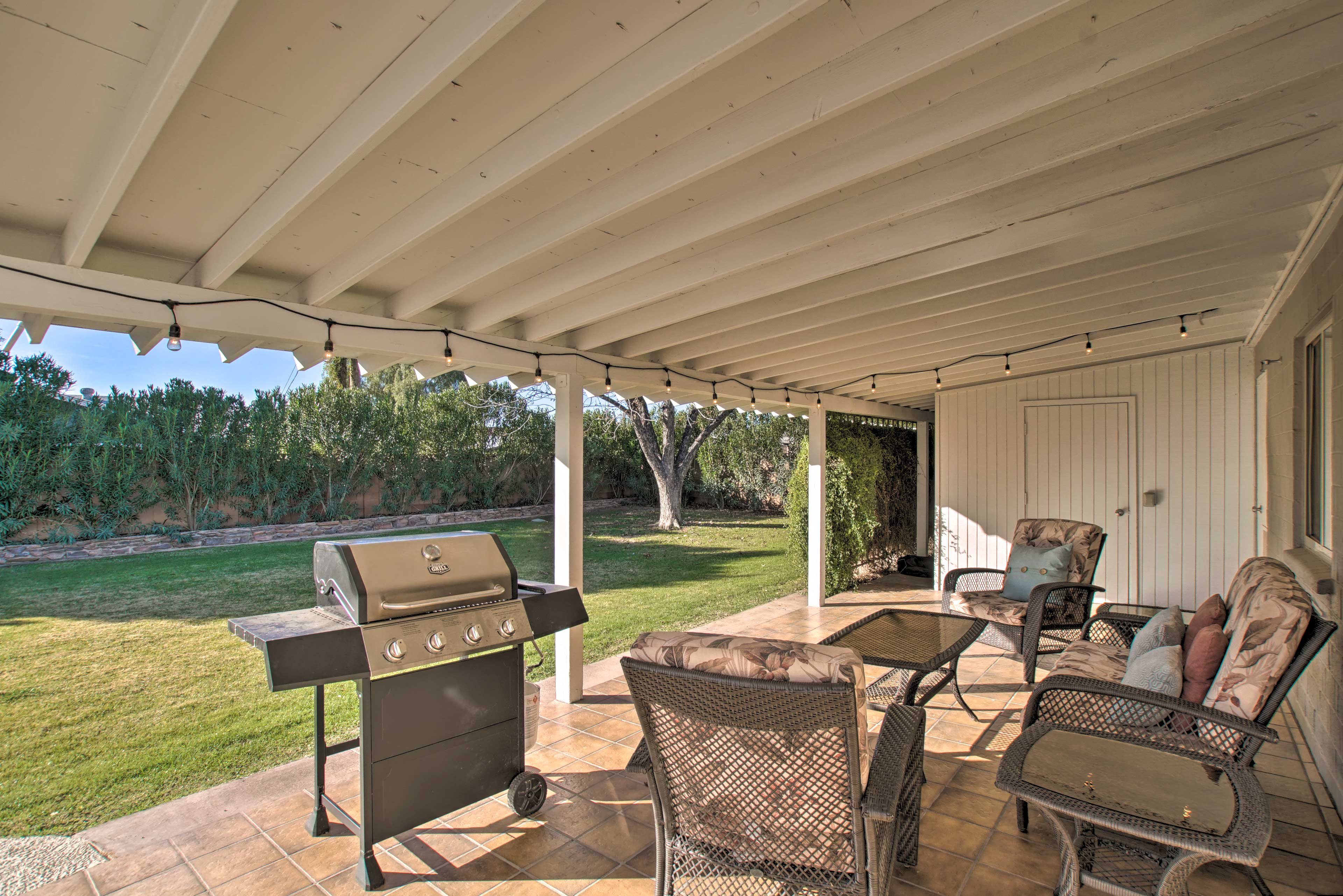 Covered Patio | Gas Grill | Seating Area | Spacious Yard
