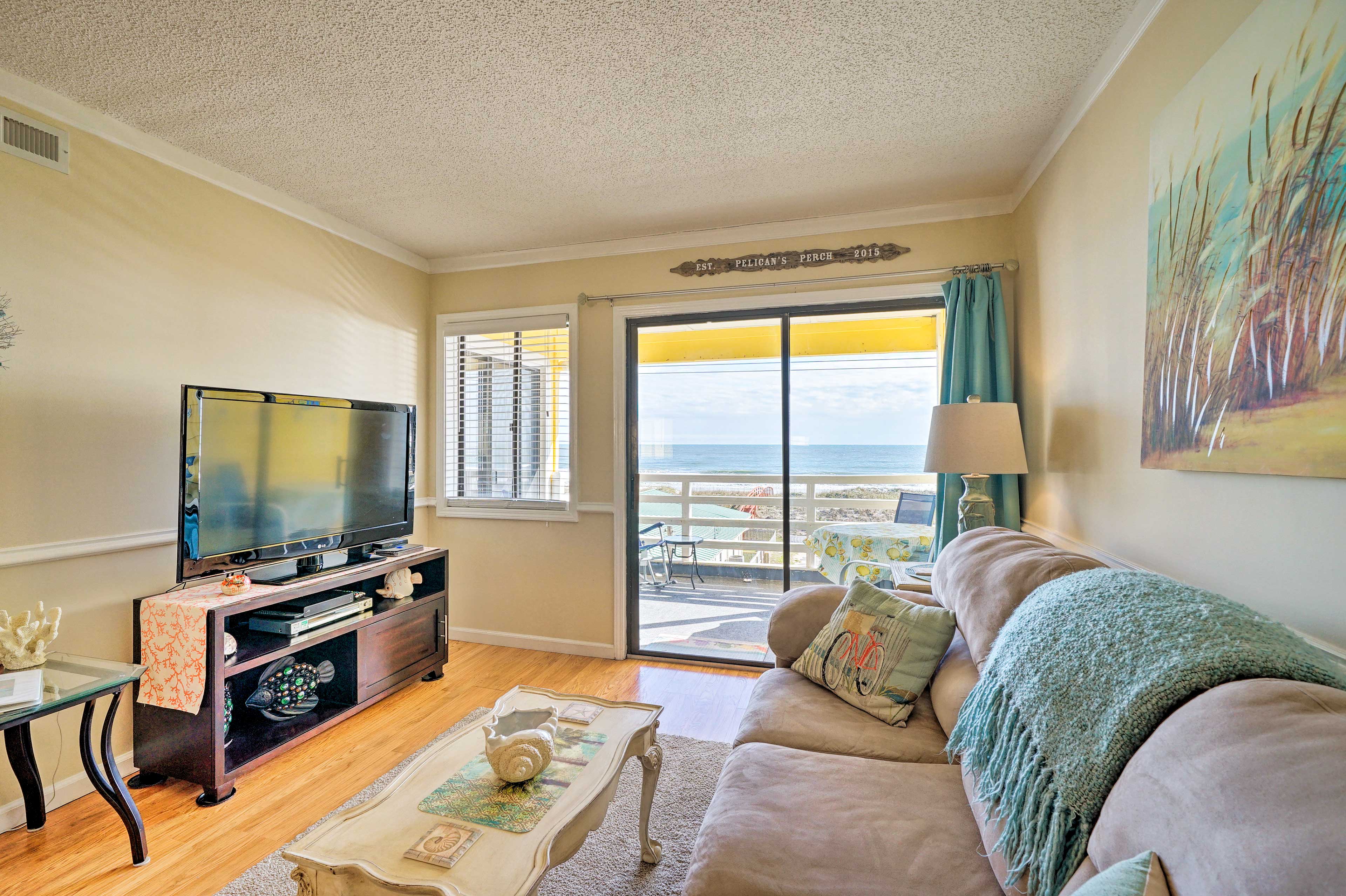 Map out your Carolina Beach retreat to this vibrant 2-bedroom, 2-bath condo!