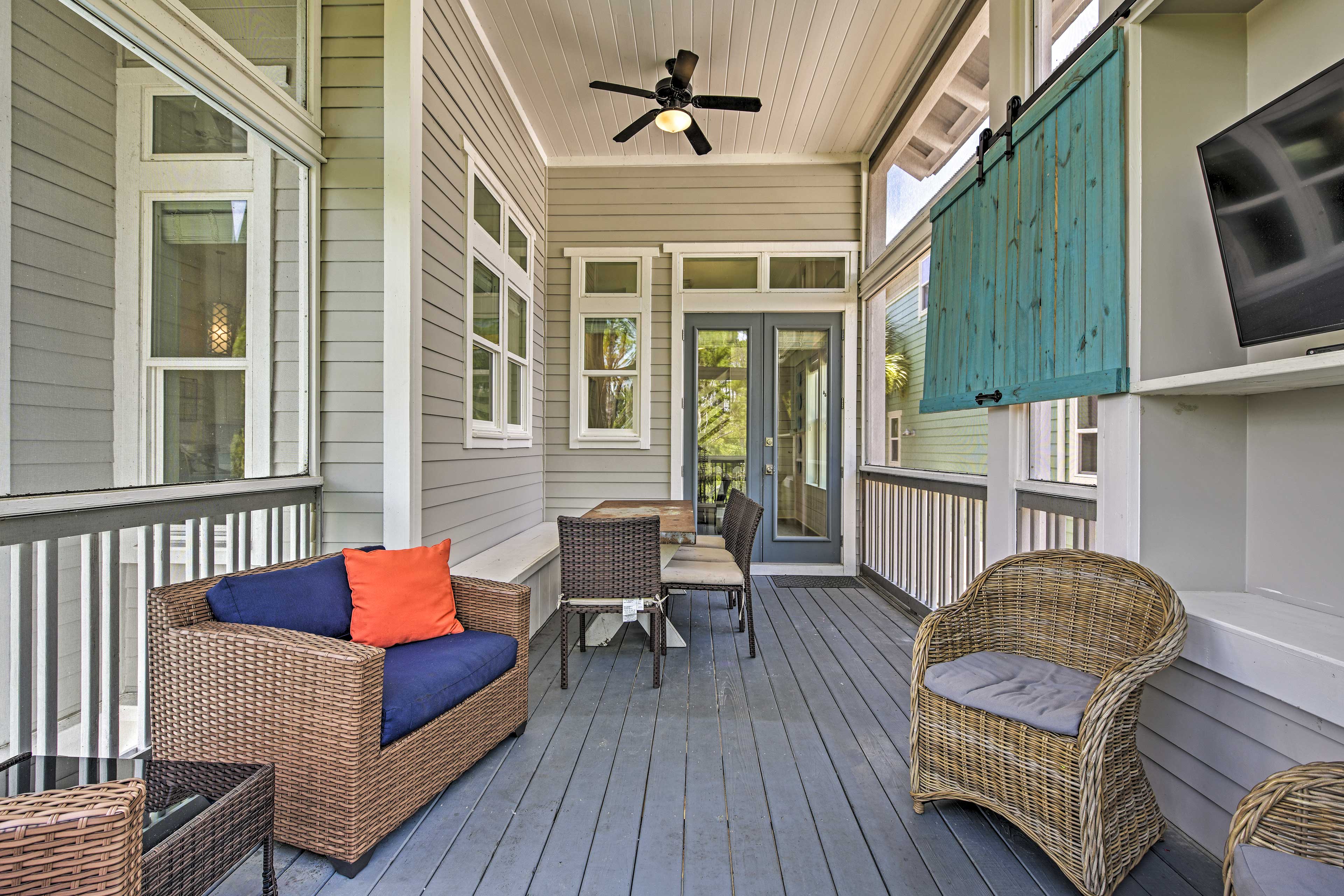 This room offers the perfect space to dine or relax with wall-to-wall windows.