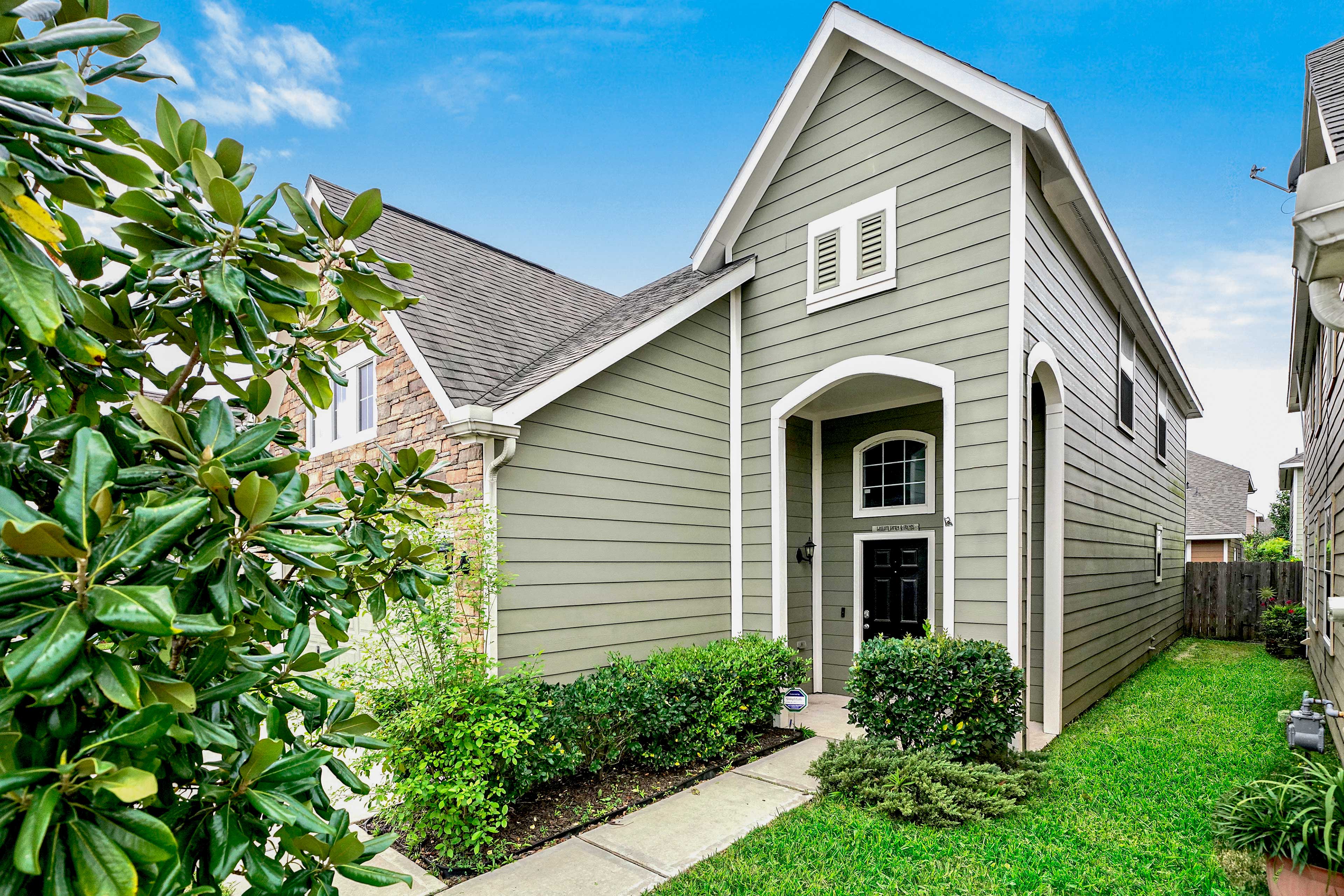 This house boasts a cheery exterior and complementing interior.