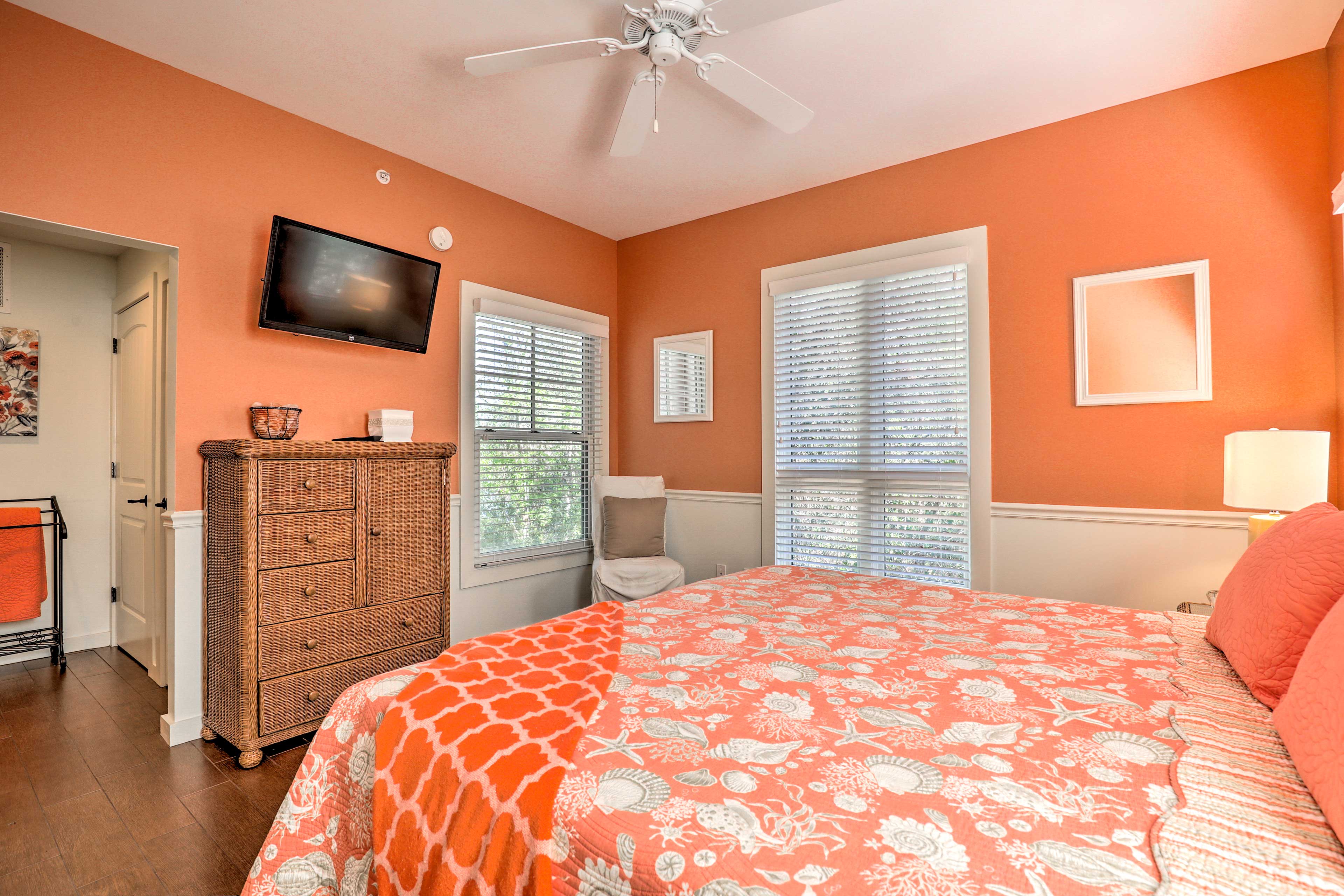 Along with a king bed, the master bedroom features an electric fireplace and TV.